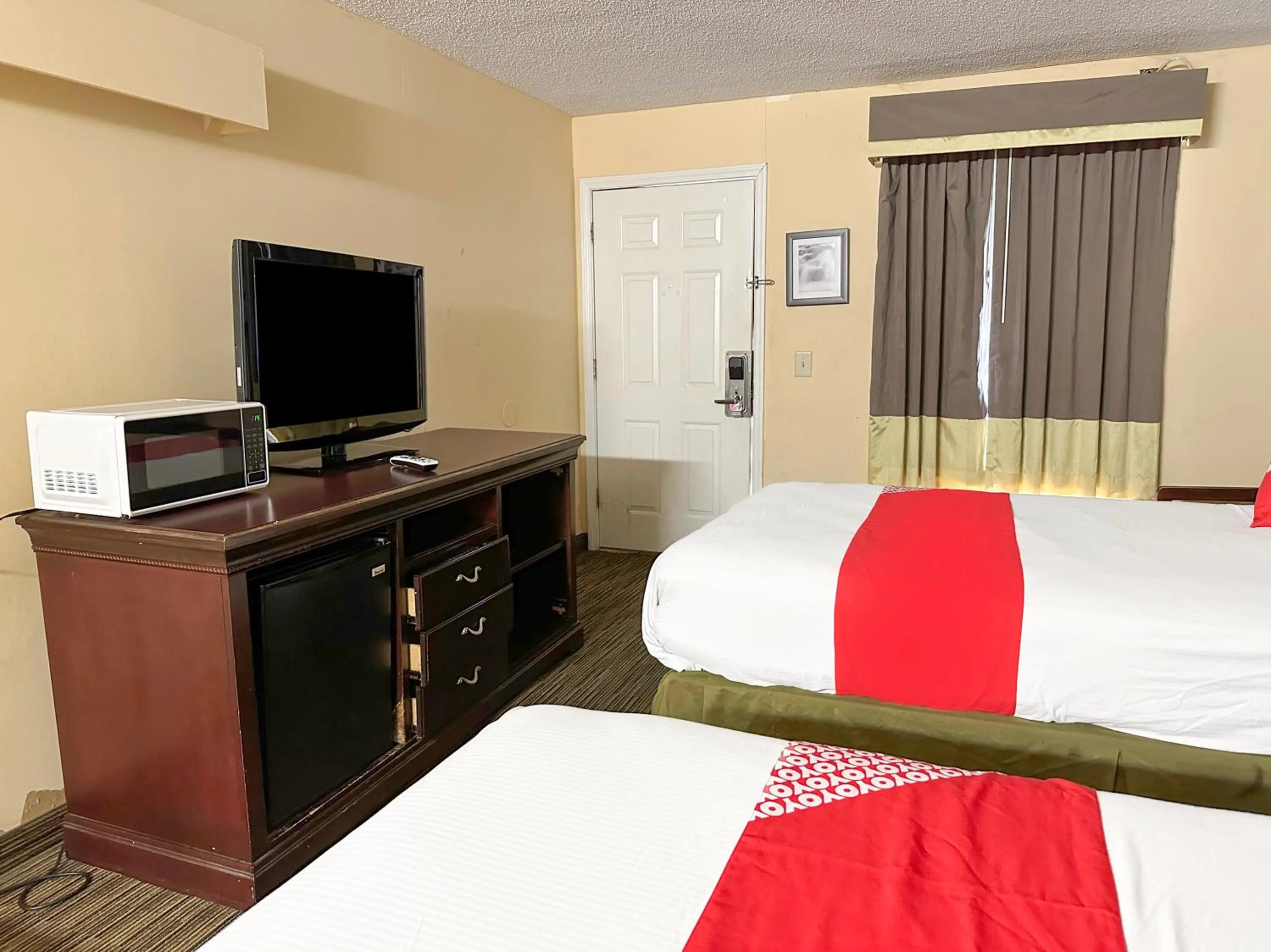 Bedroom, Bed in Bonita Lakes Inn by Capital O Meridian I20