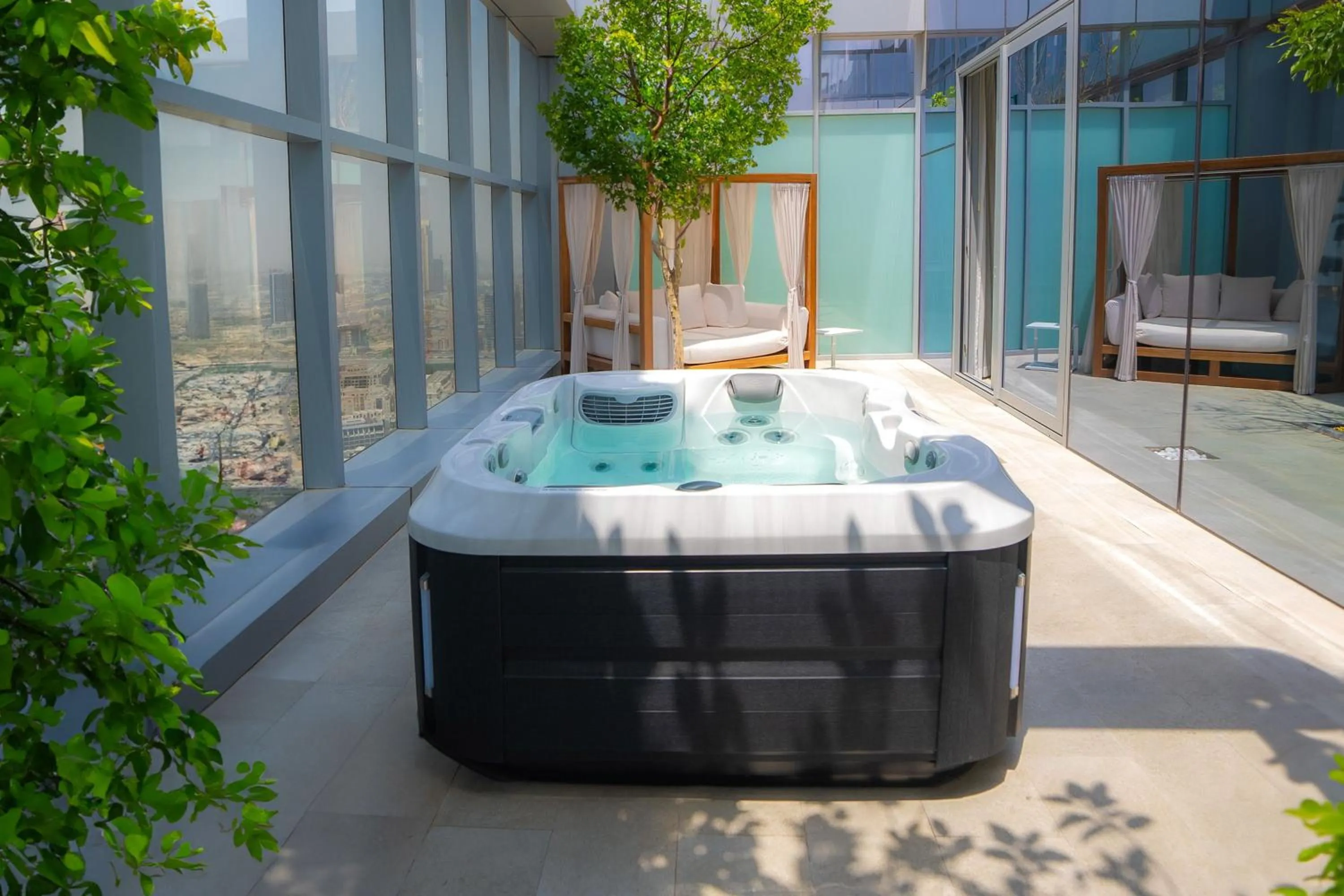 Swimming pool in The First Collection Dubai Jumeirah Village Circle, a Tribute Portfolio Hotel