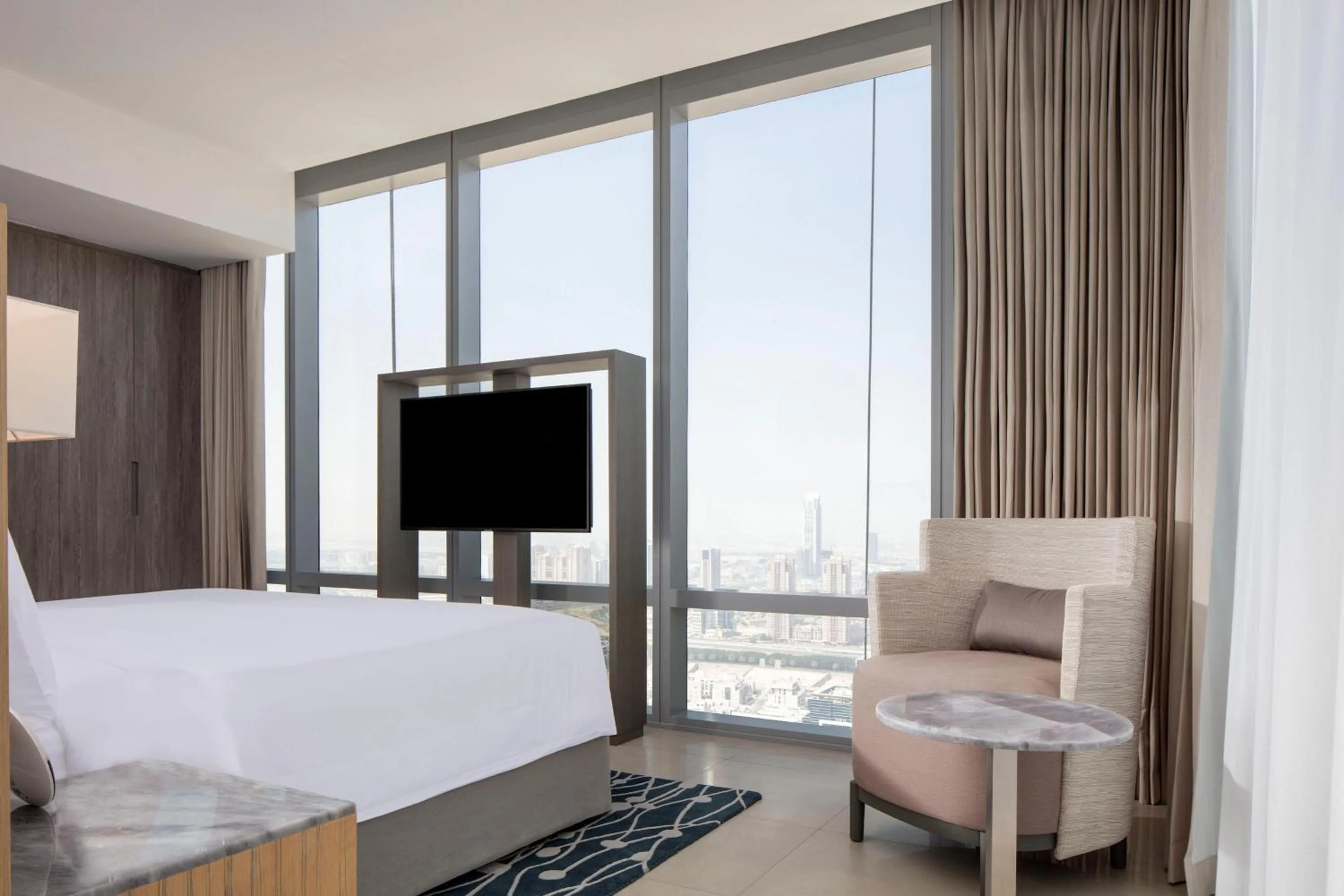 Bedroom, Bed in The First Collection Dubai Jumeirah Village Circle, a Tribute Portfolio Hotel