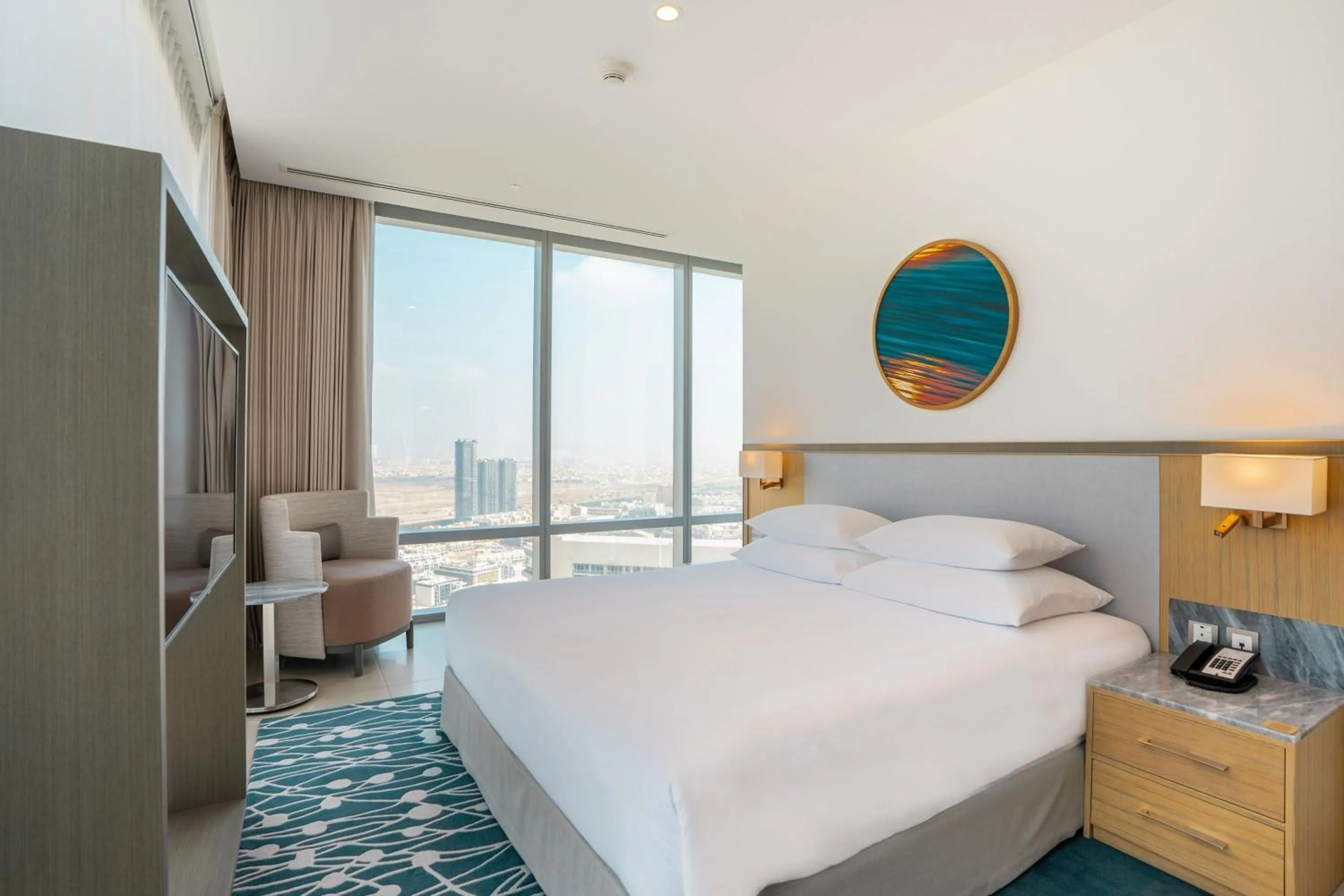 Photo of the whole room, Bed in The First Collection Dubai Jumeirah Village Circle, a Tribute Portfolio Hotel