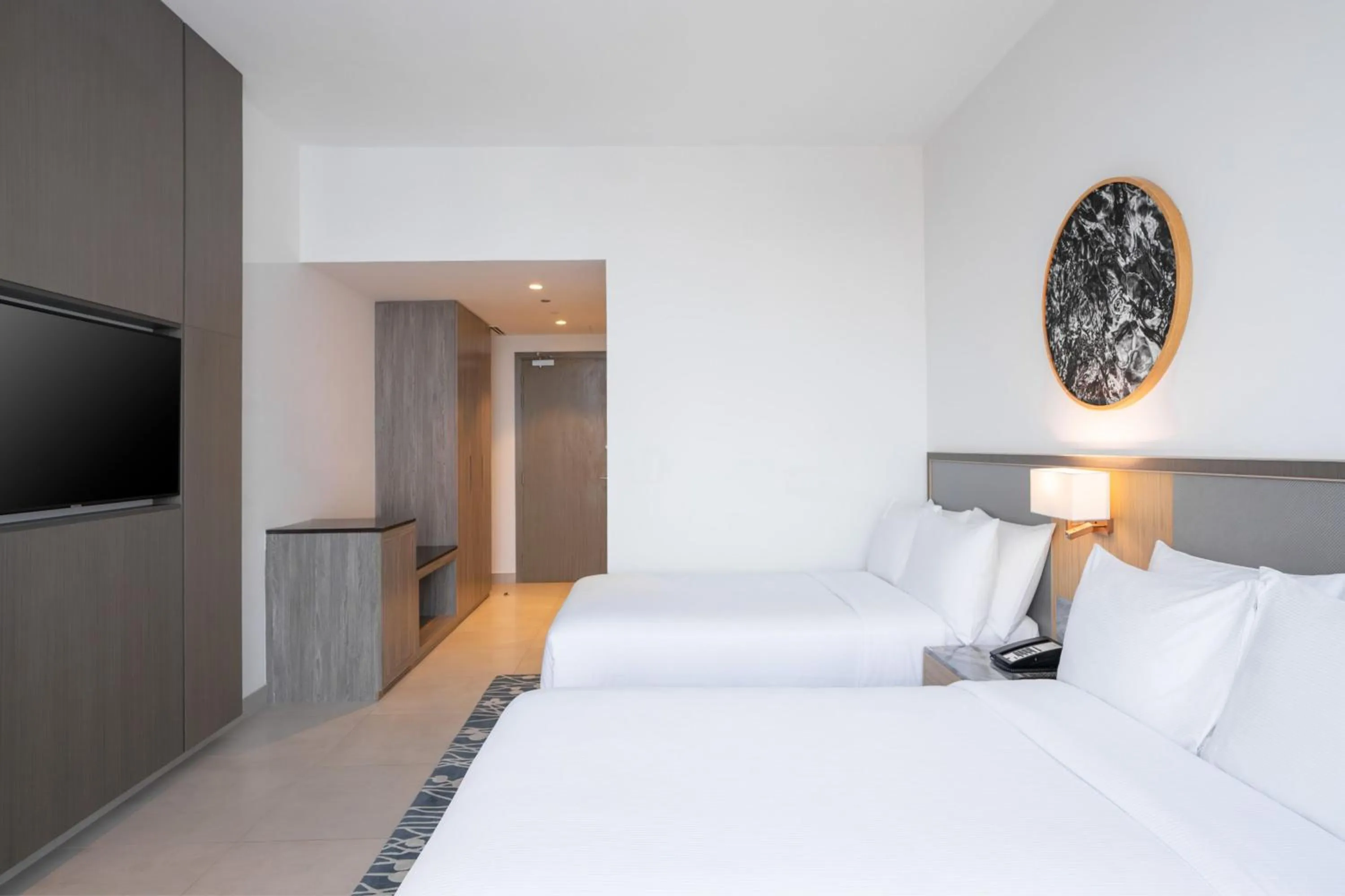 Photo of the whole room, Bed in The First Collection Dubai Jumeirah Village Circle, a Tribute Portfolio Hotel