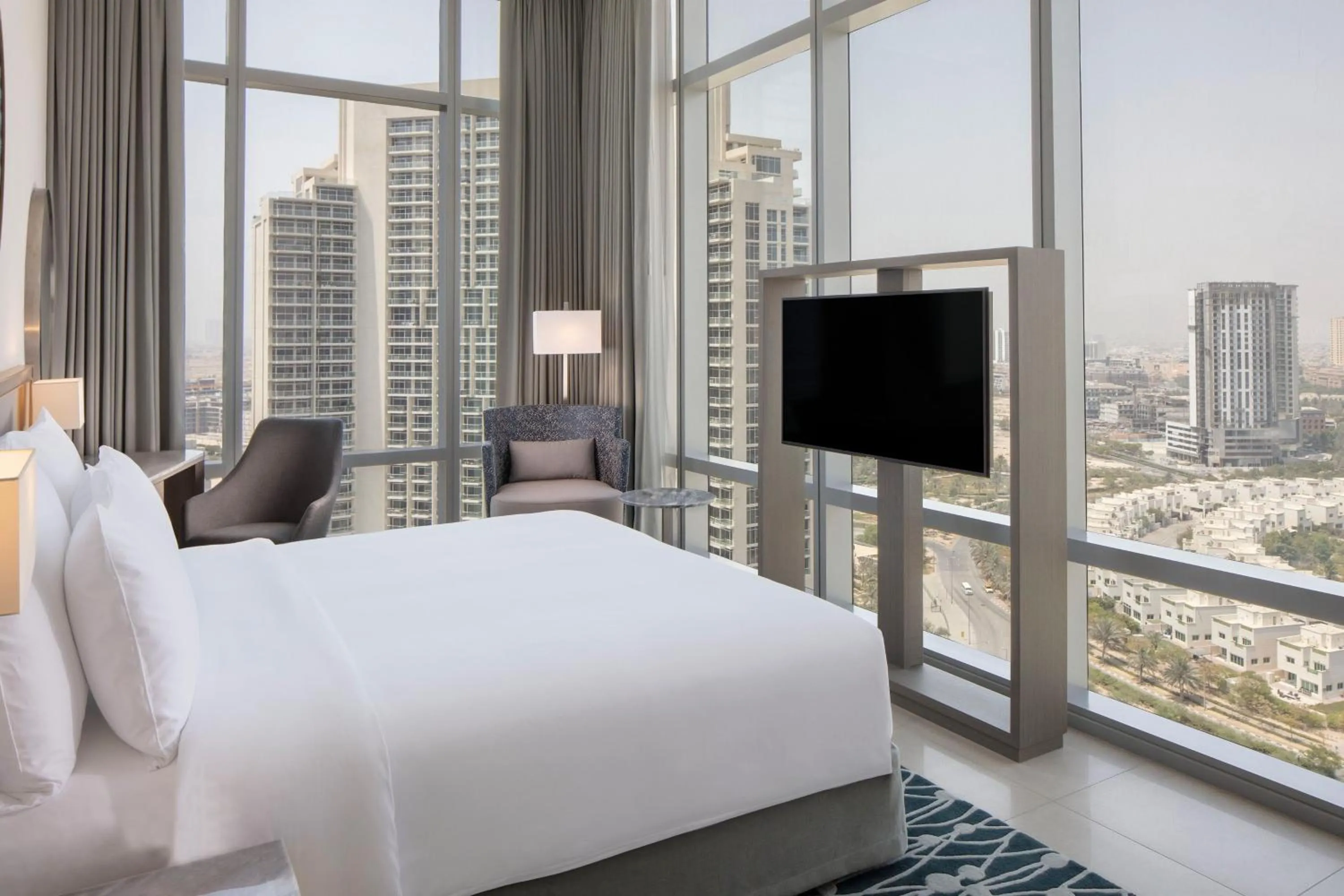 Photo of the whole room, Bed in The First Collection Dubai Jumeirah Village Circle, a Tribute Portfolio Hotel