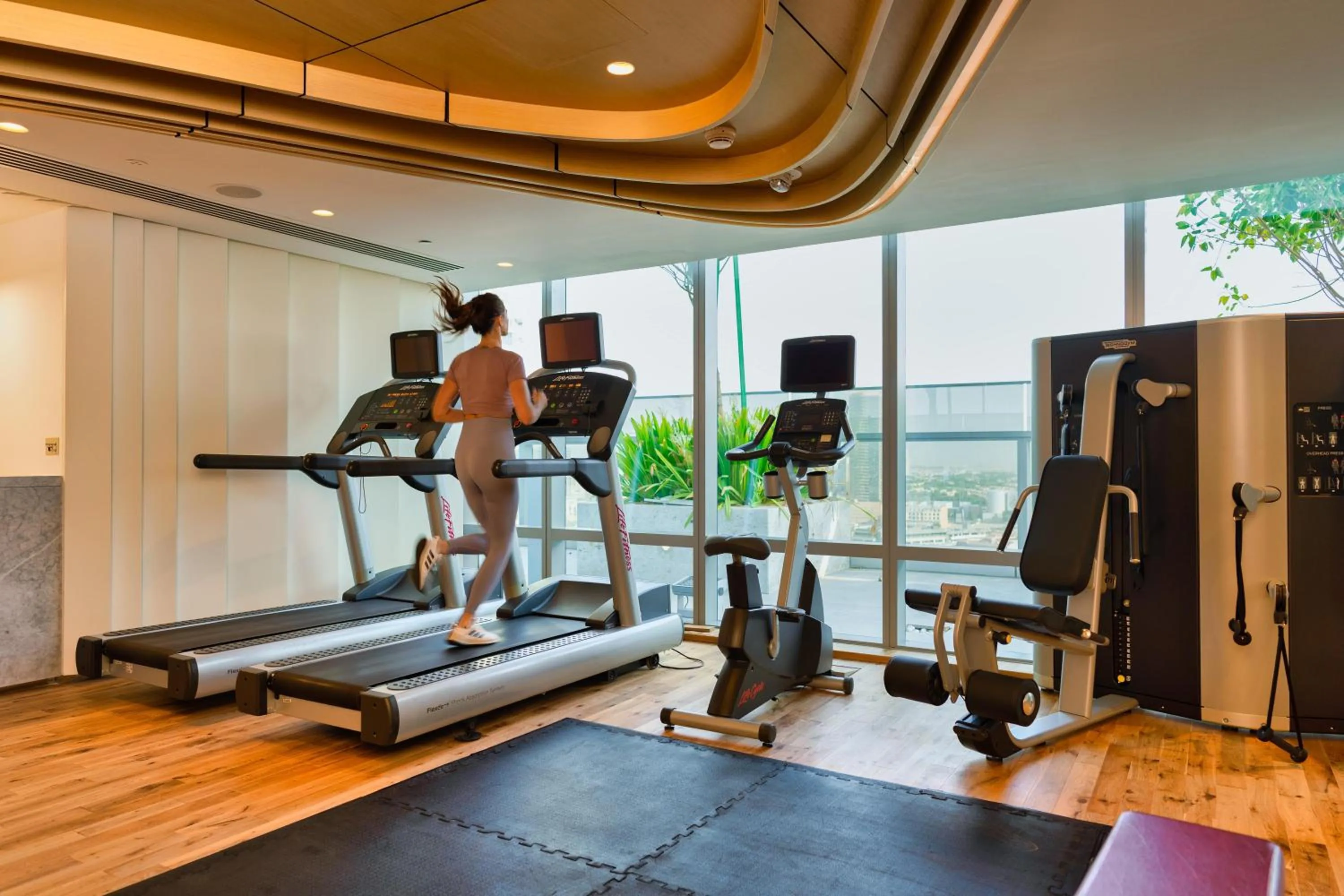 Fitness centre/facilities in The First Collection Dubai Jumeirah Village Circle, a Tribute Portfolio Hotel