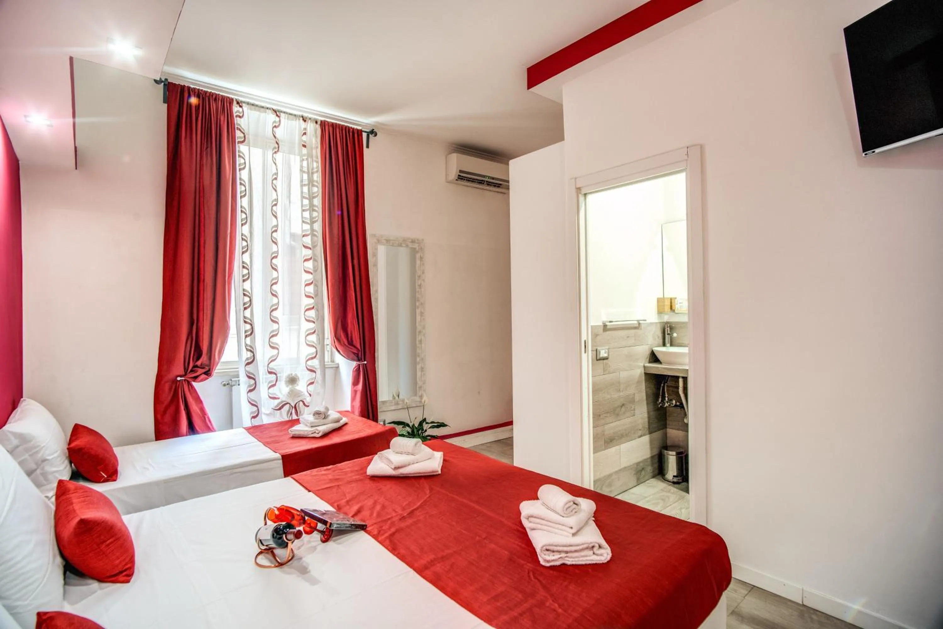 Bed in ROYAL VATICAN SUITES