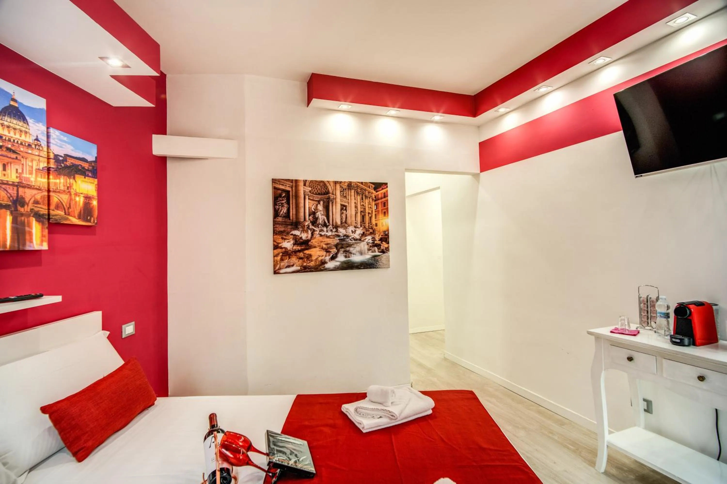 Bed in ROYAL VATICAN SUITES