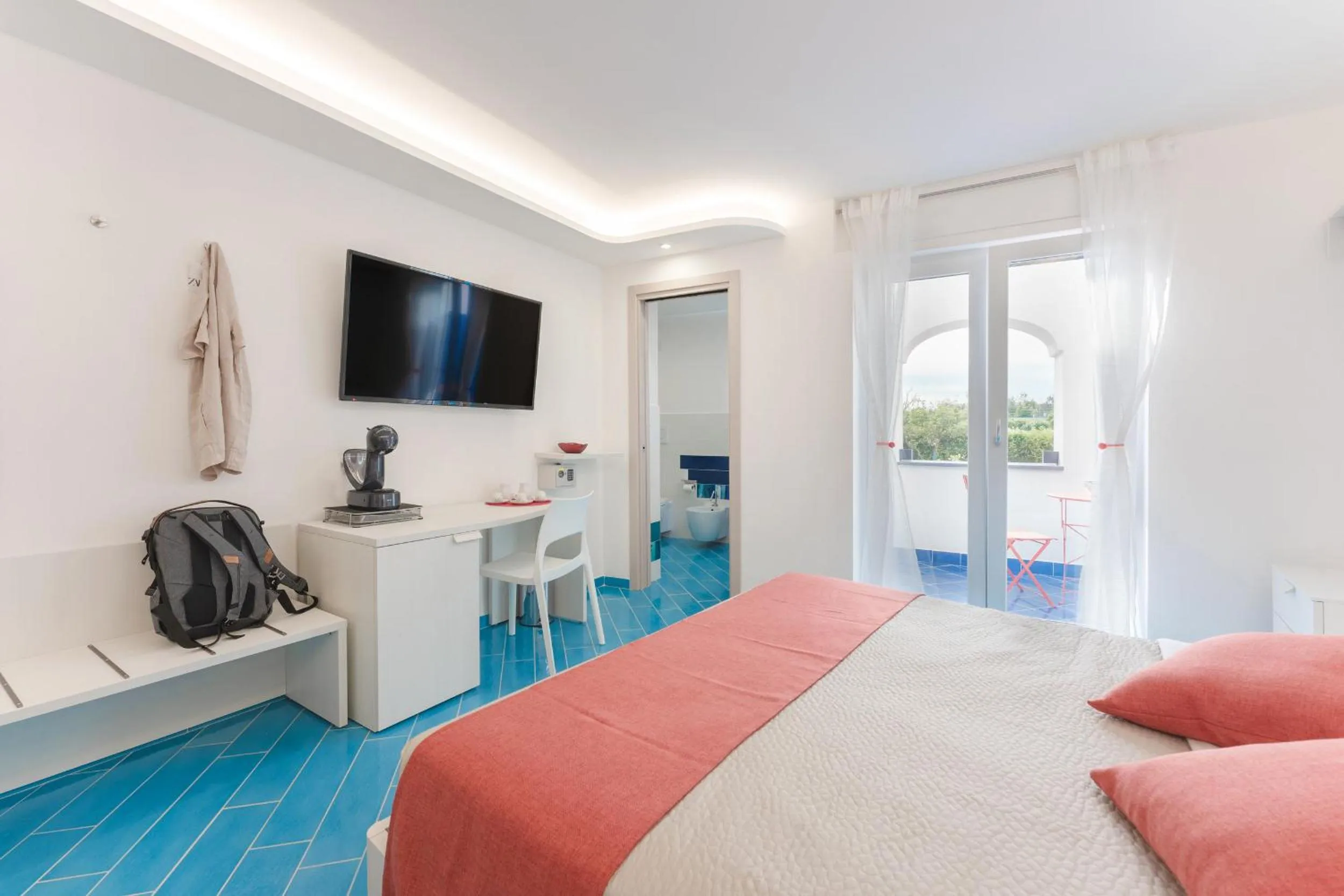 Bed in Il Corallo Residence