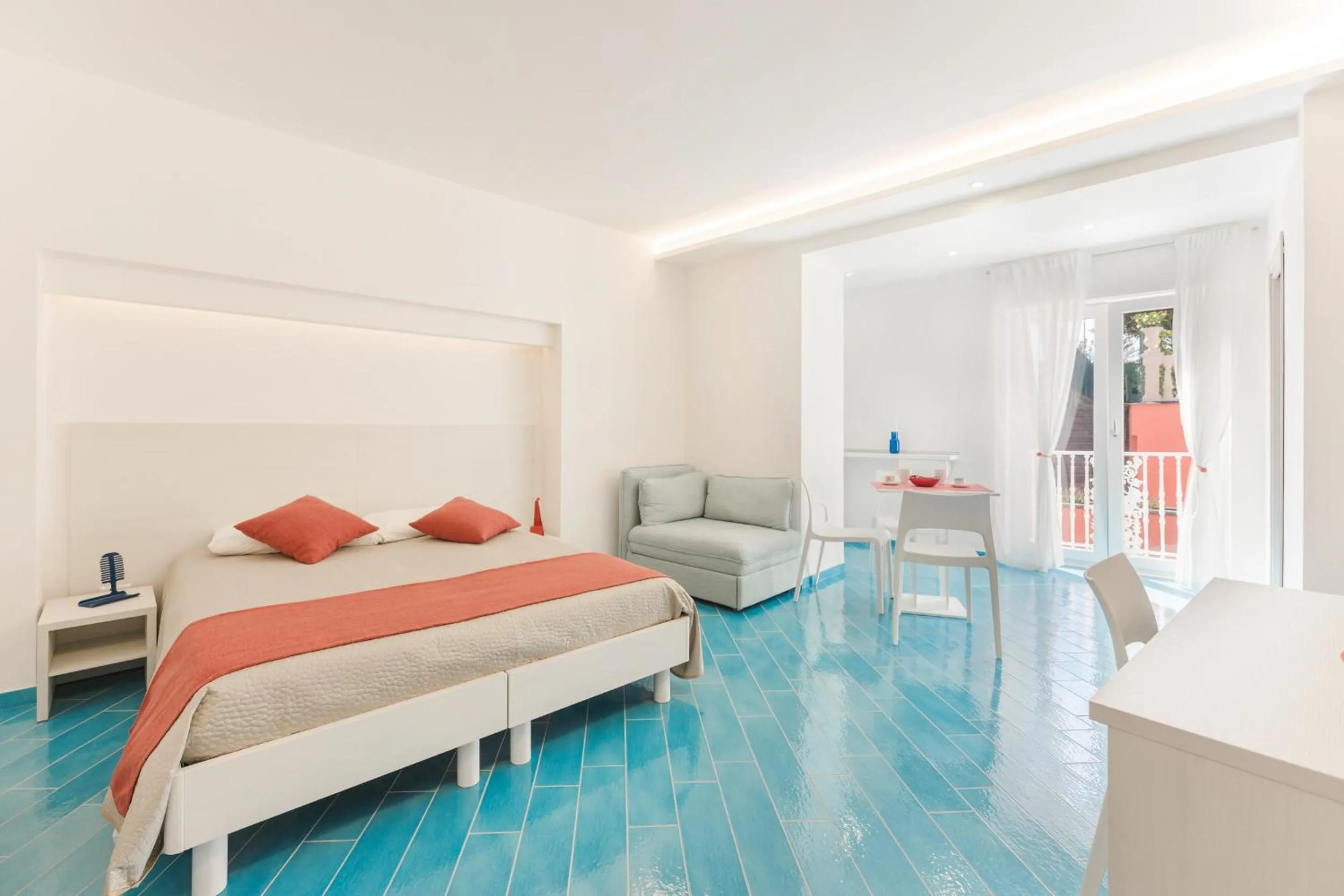 Bed in Il Corallo Residence