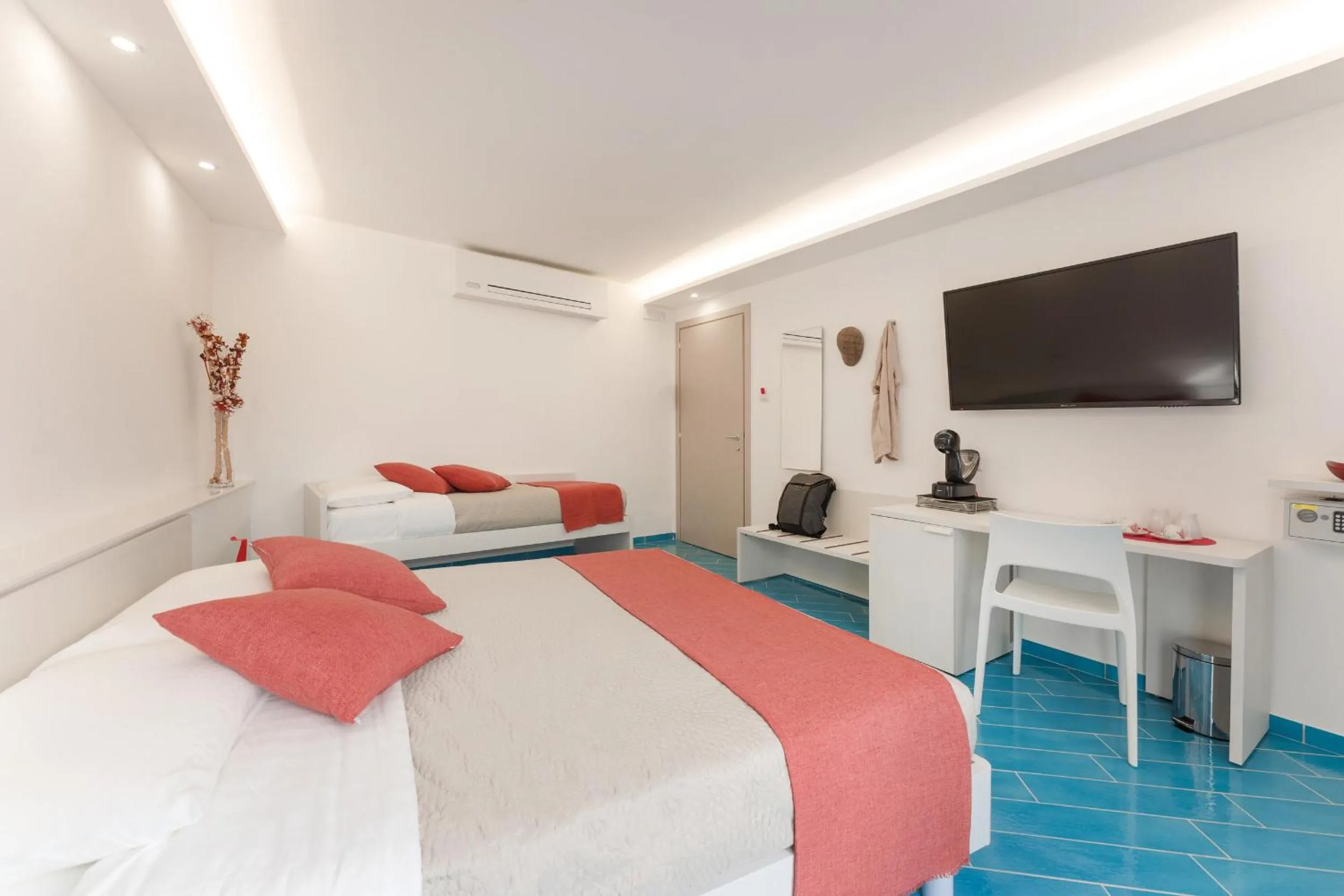 Bed in Il Corallo Residence