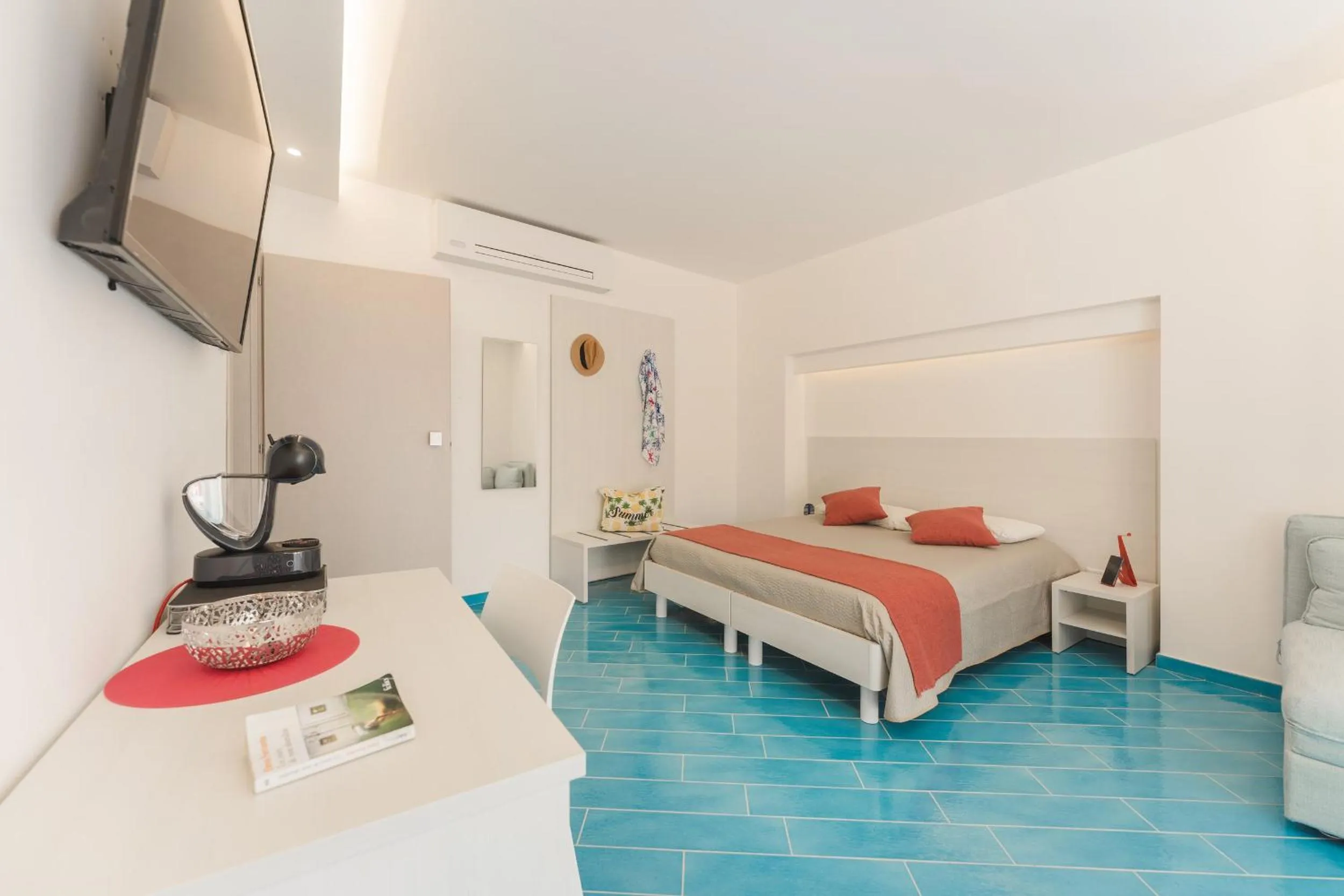 Bed in Il Corallo Residence