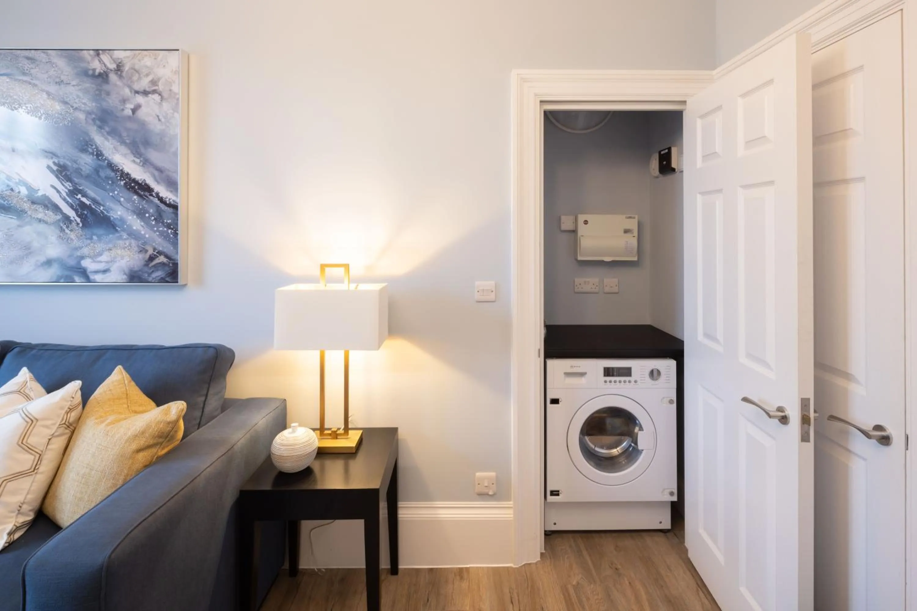 washing machine in Redmayne House - Urban Apartments