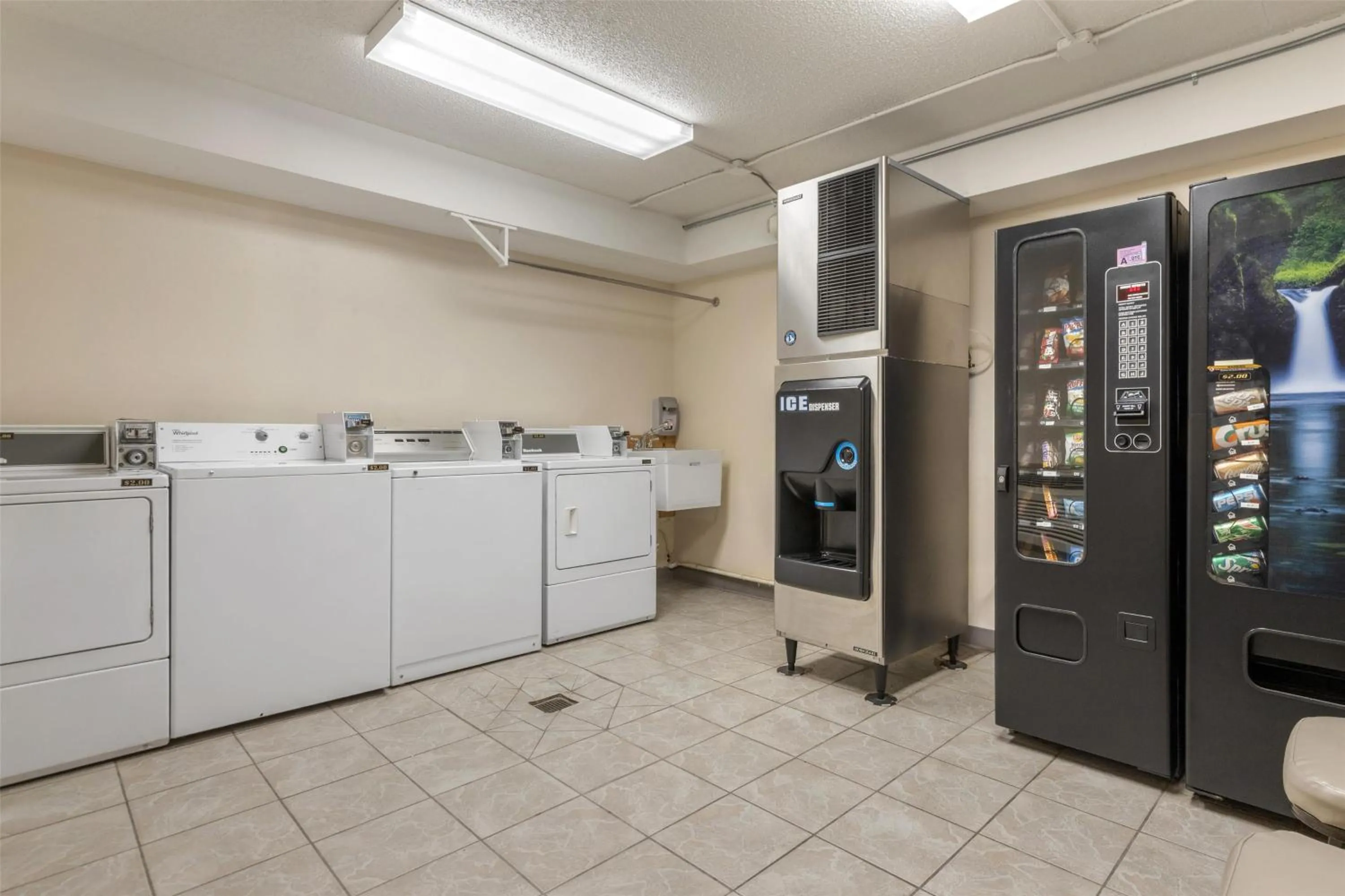 Property building in SureStay Plus Hotel by Best Western Poteau