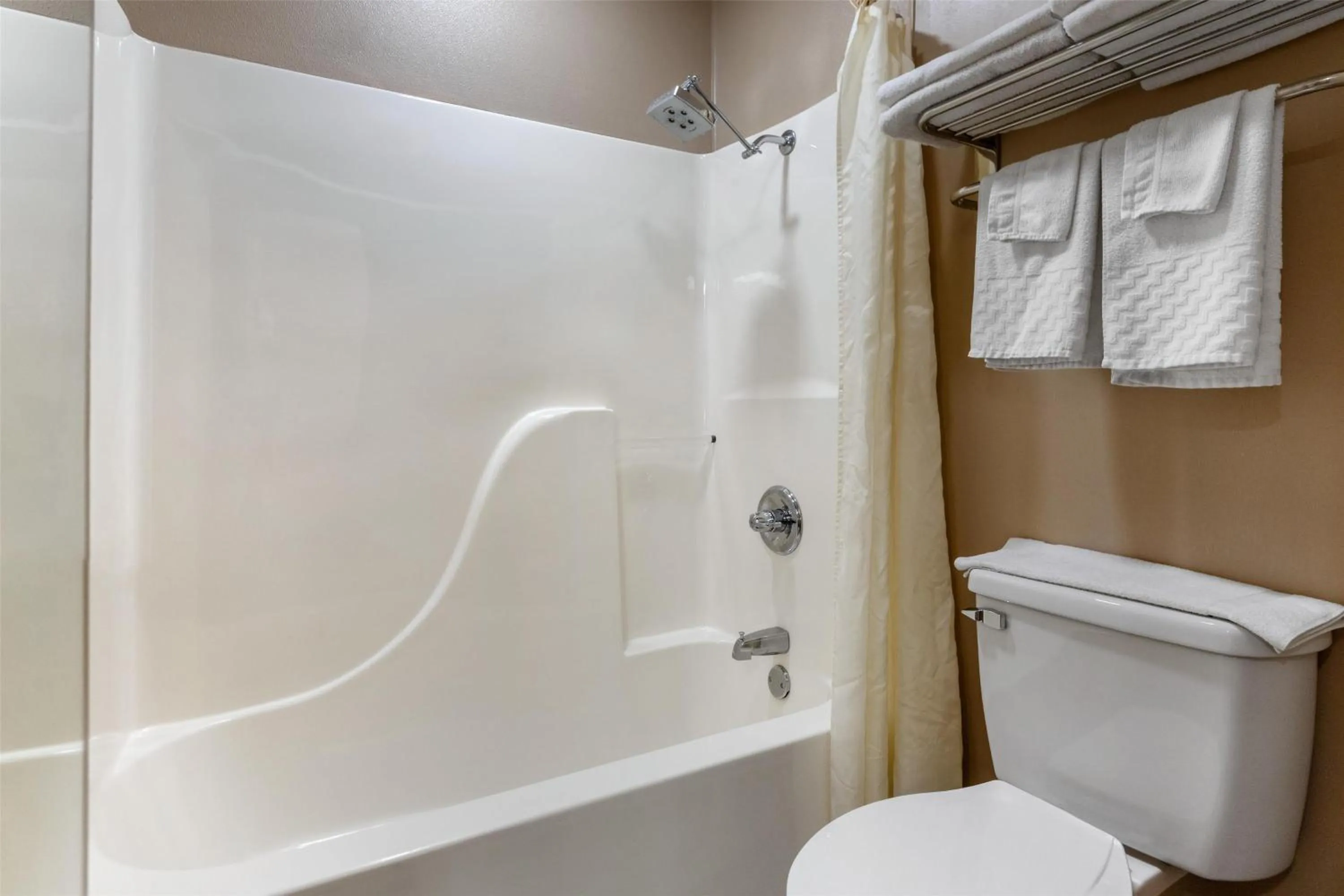 Bathroom in SureStay Plus Hotel by Best Western Poteau