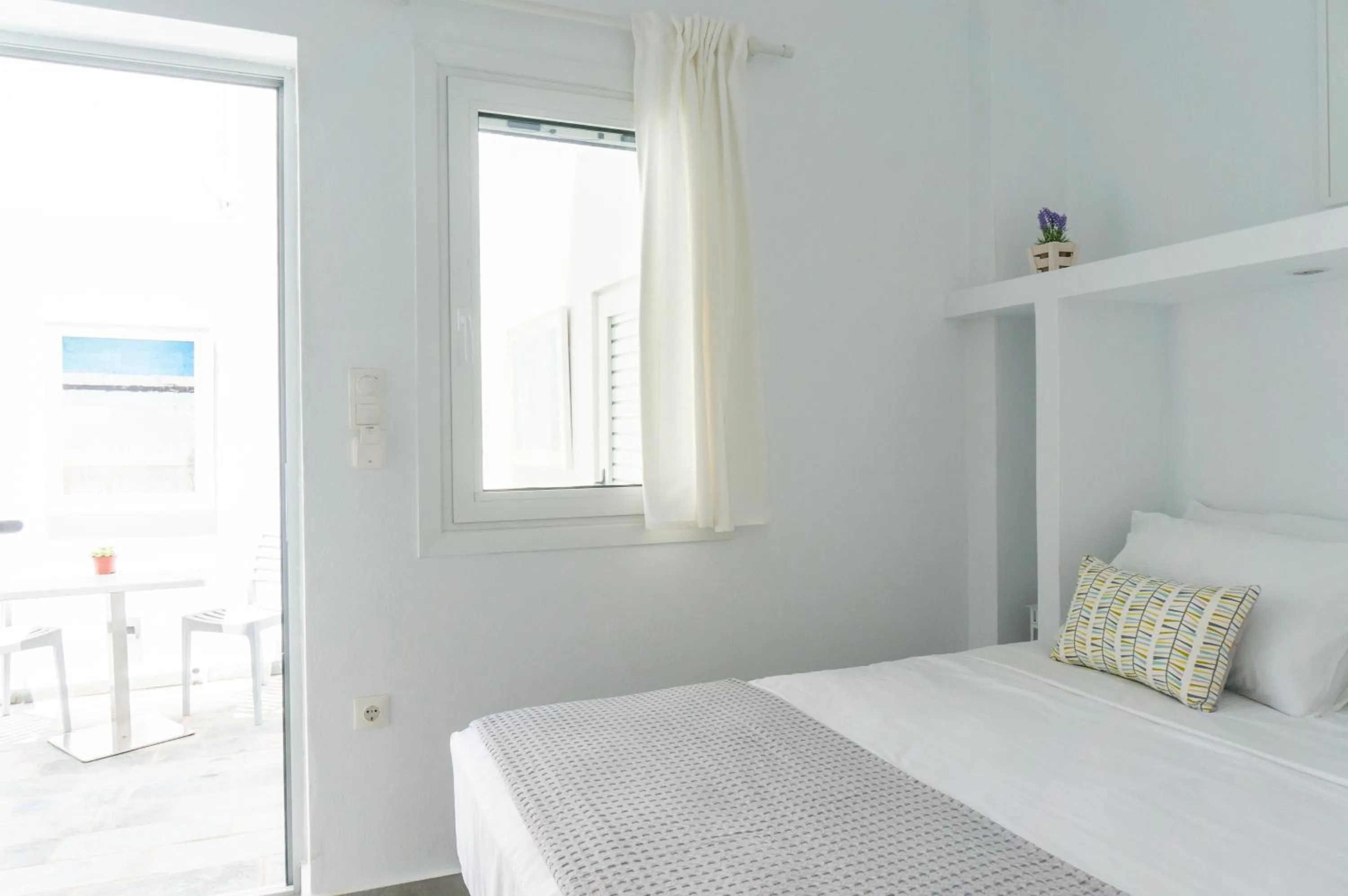 Photo of the whole room, Bed in Pelican Paros