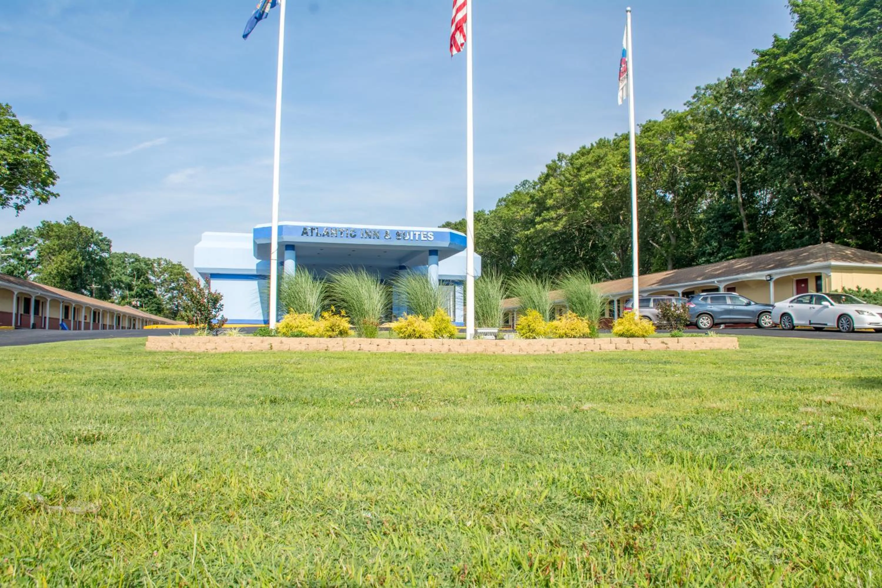 Property logo or sign in Atlantic Inn and Suites - Wall Township