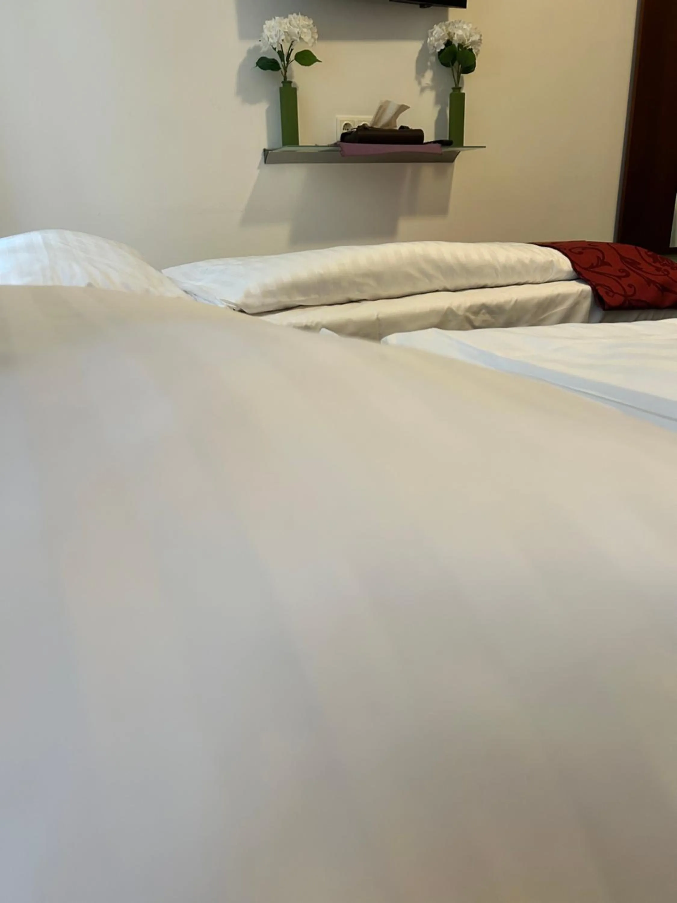 Bed in Pension Stadthalle