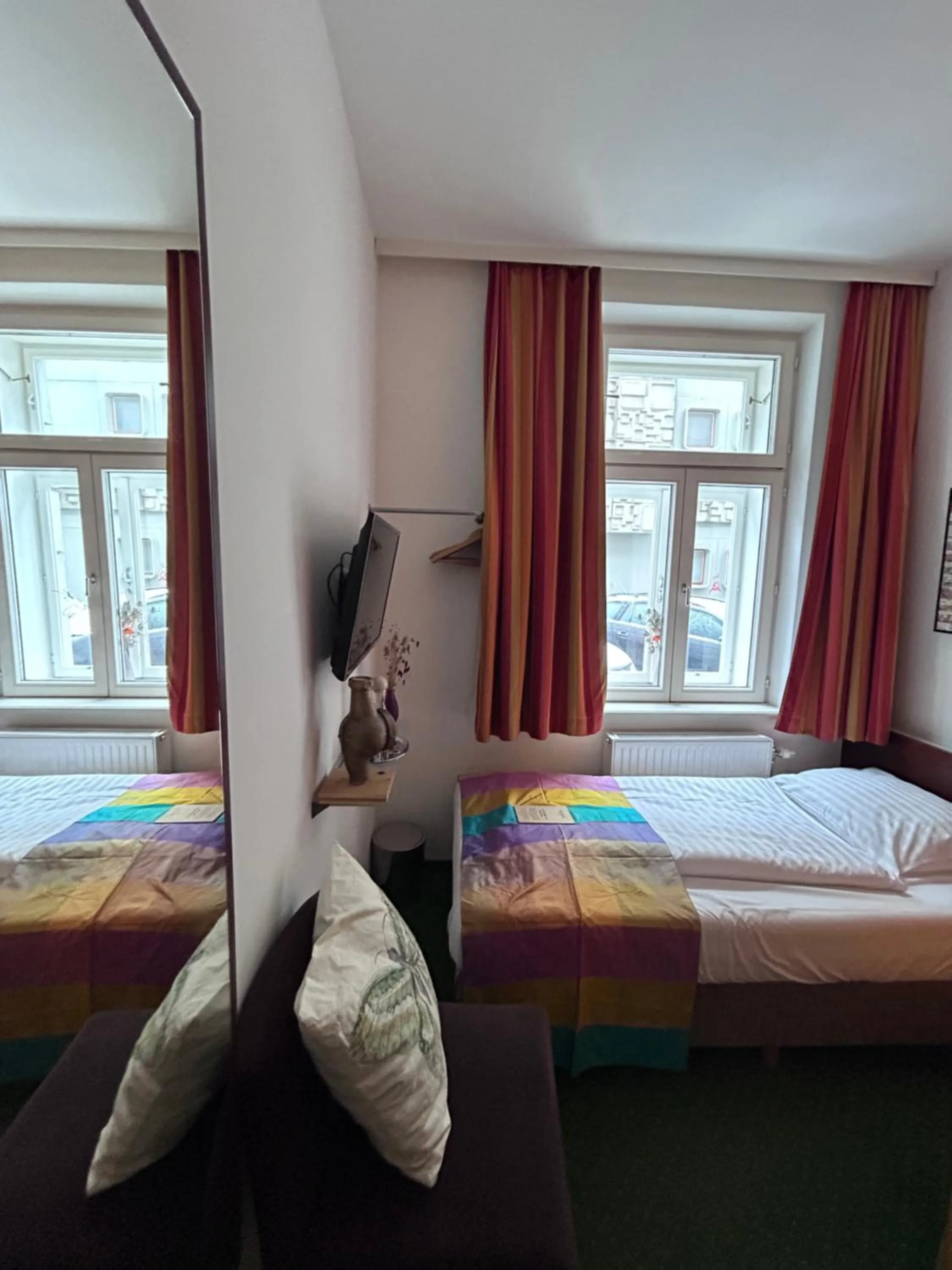 Photo of the whole room, Bed in Pension Stadthalle