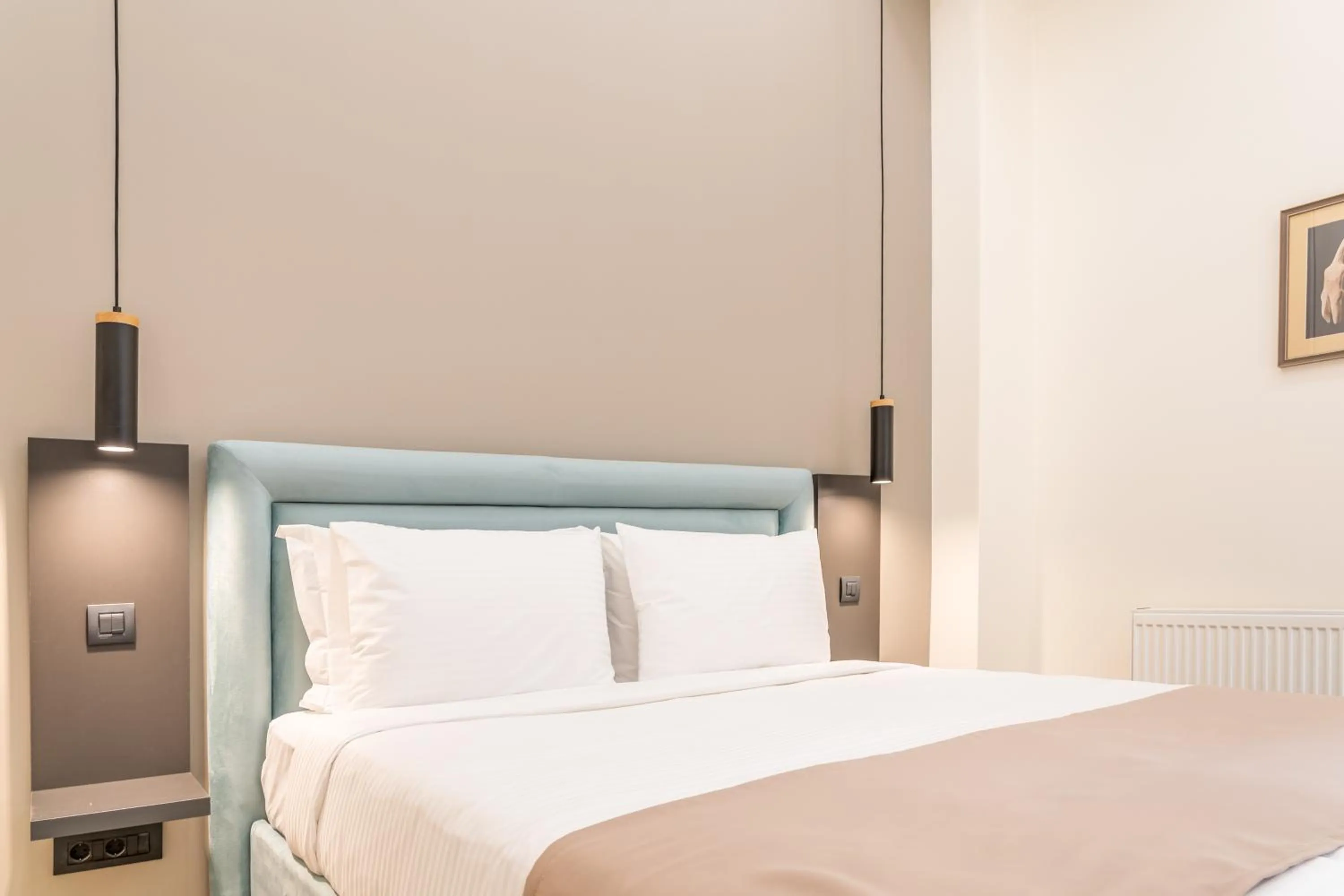 Bed in Philia Boutique Hotel