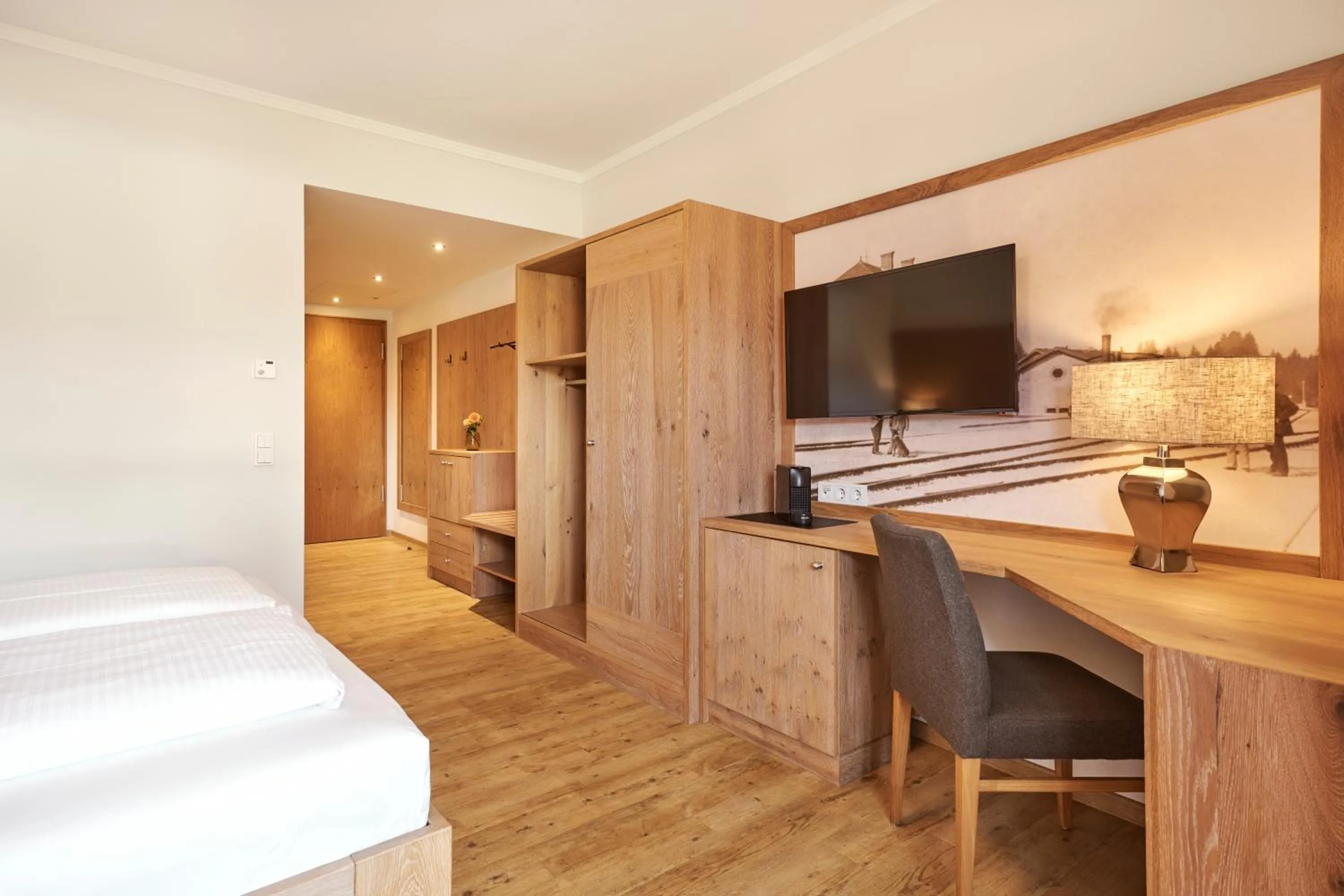 Bed in Hotel Auf der Gsteig GmbH