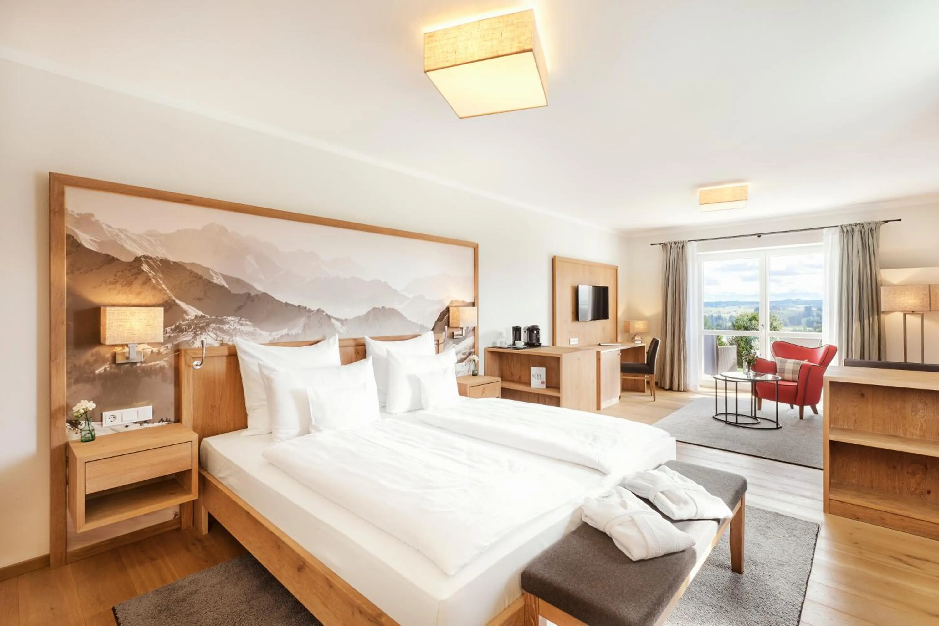 Bed in Hotel Auf der Gsteig GmbH