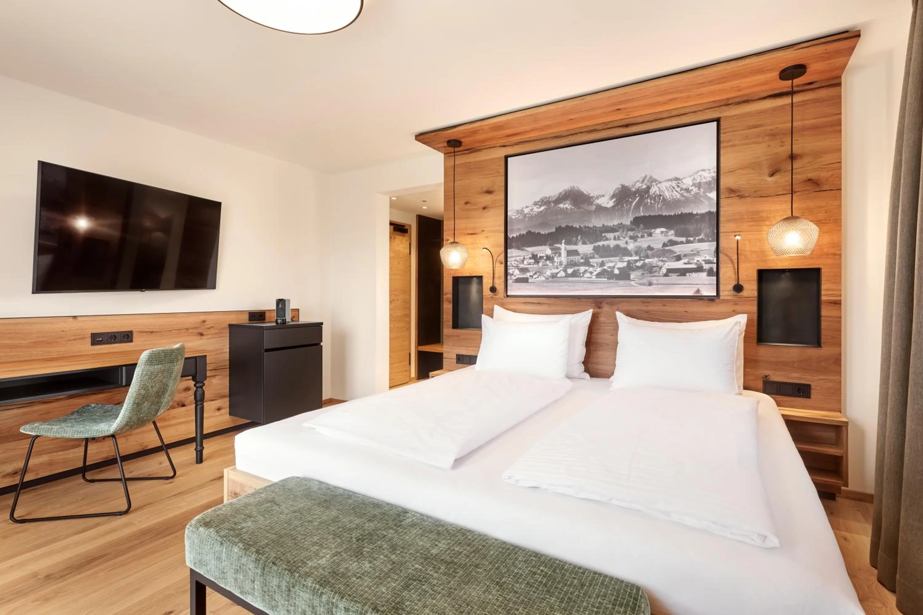 Bed in Hotel Auf der Gsteig GmbH