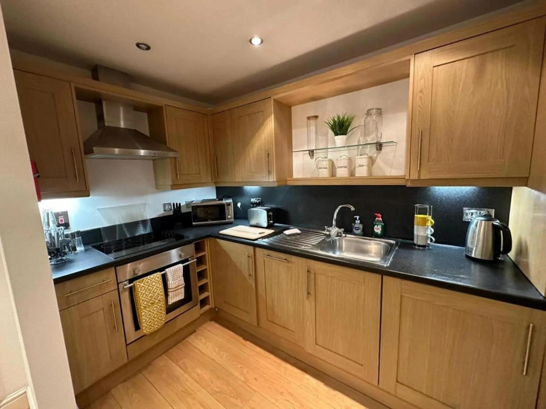 Kitchen or kitchenette in The Old Library - Modern Apartment near the Train Station and Racecourse