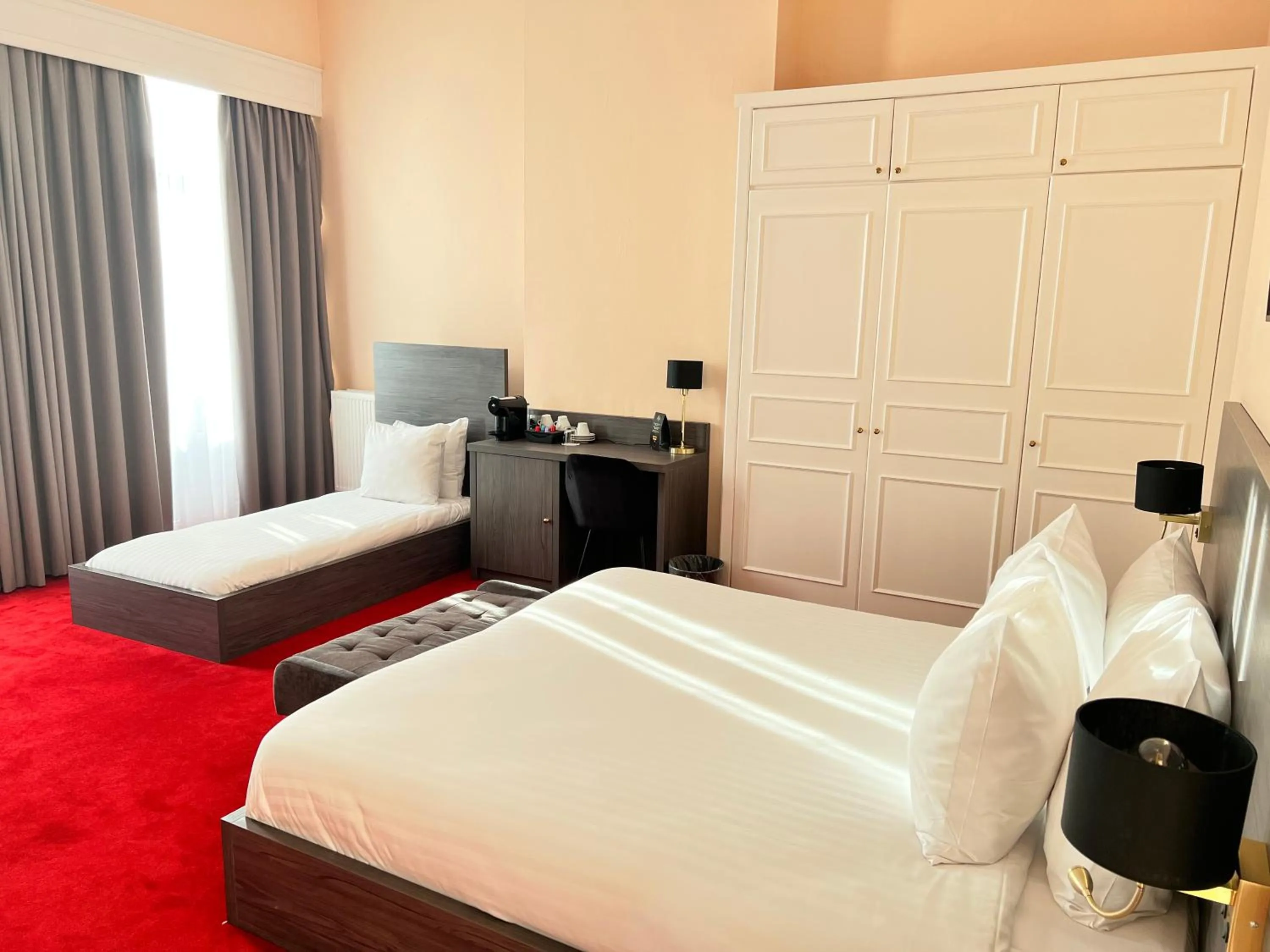 Bed in La Bourse Hotel