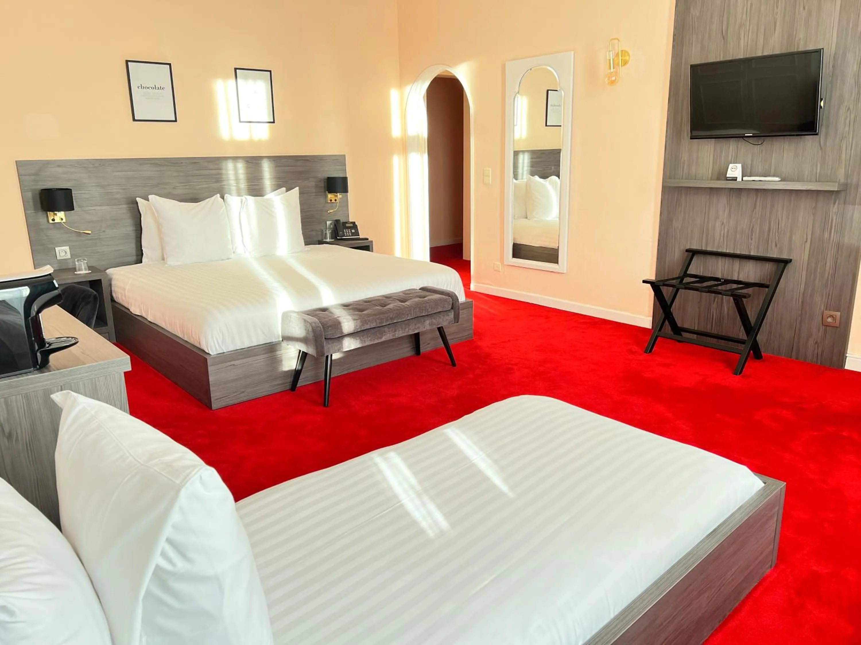 Bed in La Bourse Hotel