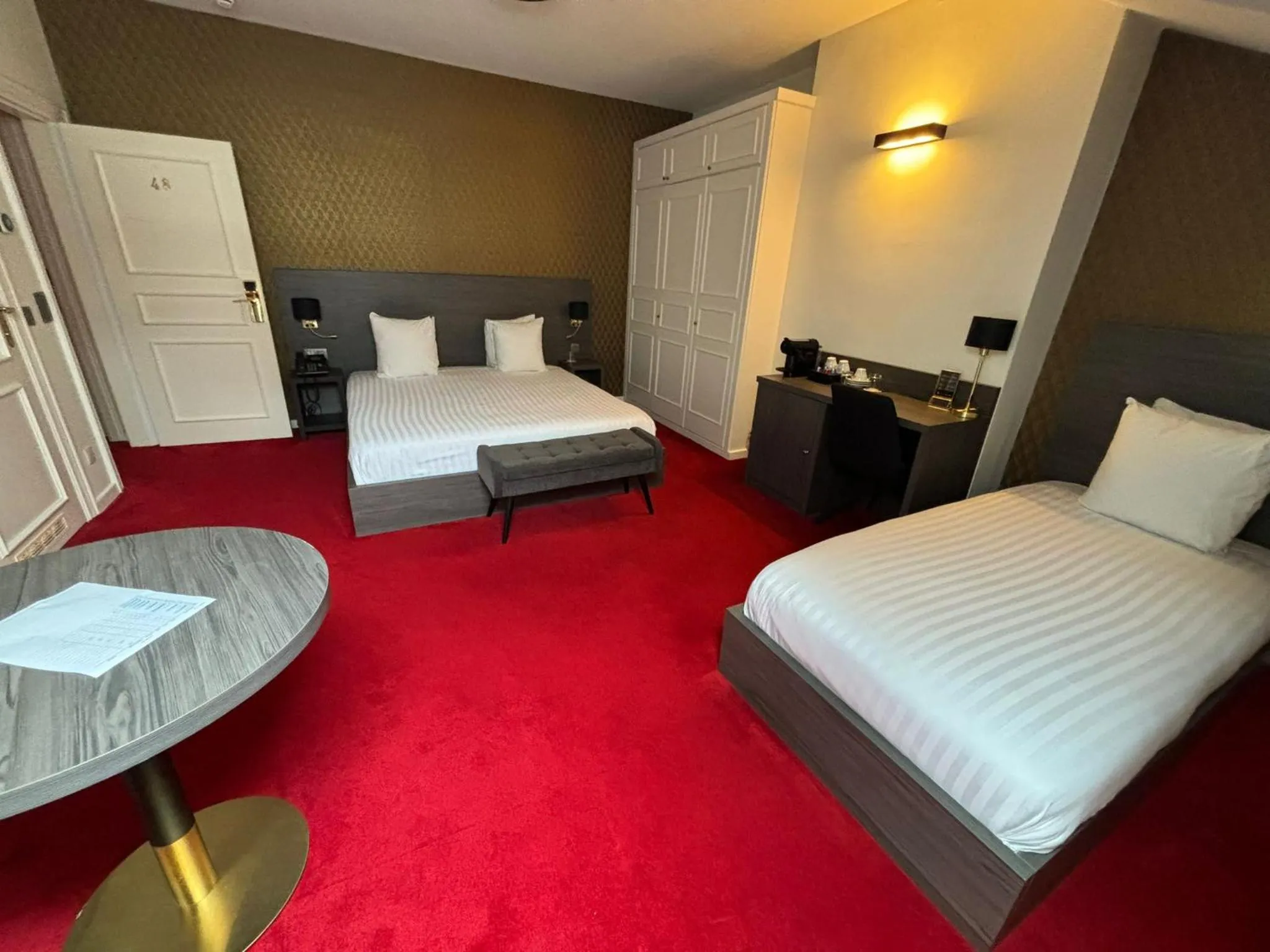Bed in La Bourse Hotel