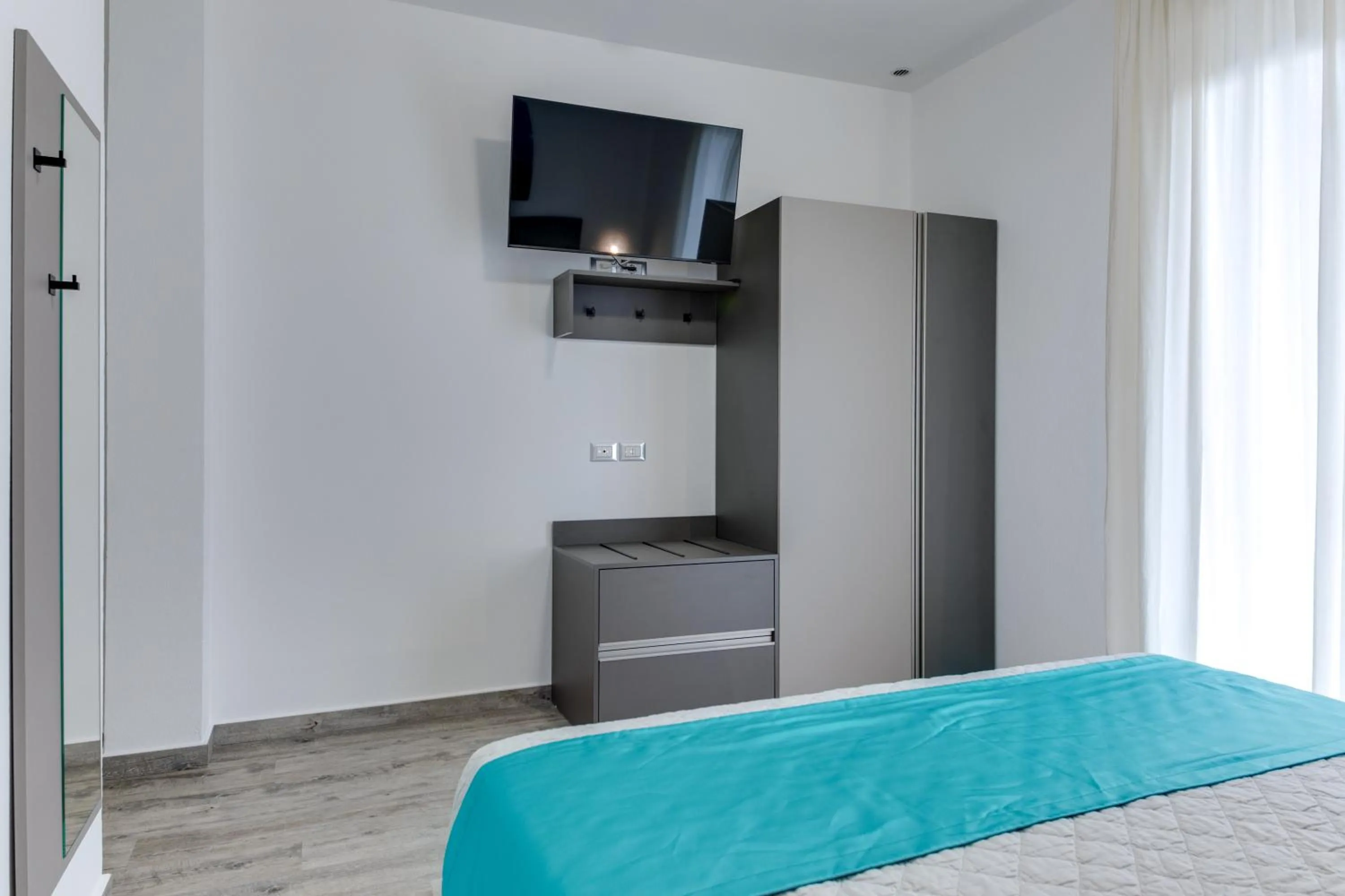 Bedroom, Bed in Elegance Suite Apartments - Siroli Collection