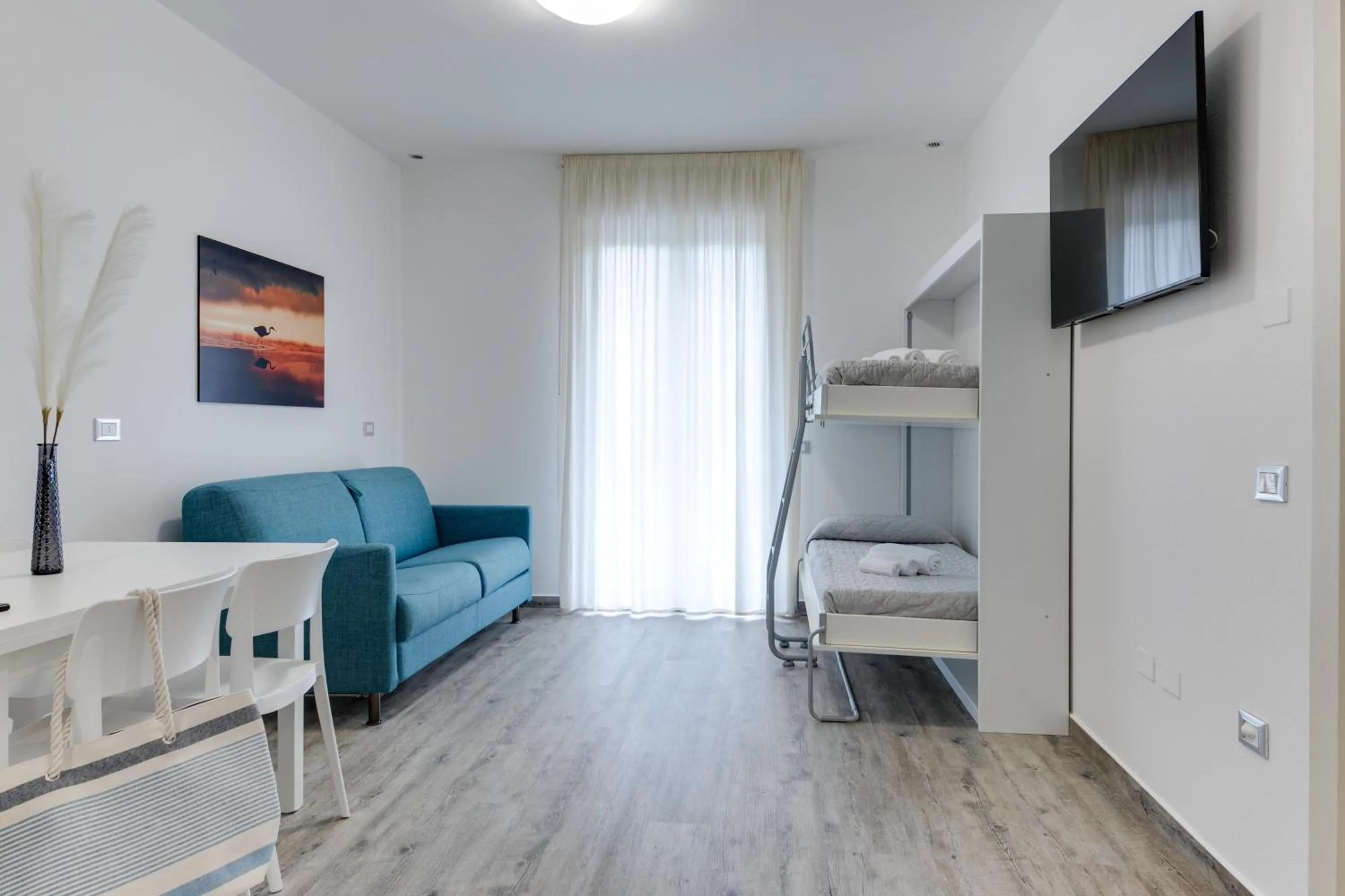 Living room, Bed in Elegance Suite Apartments - Siroli Collection