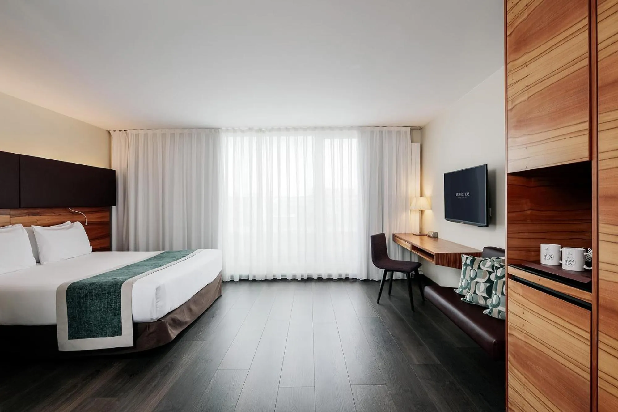 Bed in Eurostars Embassy