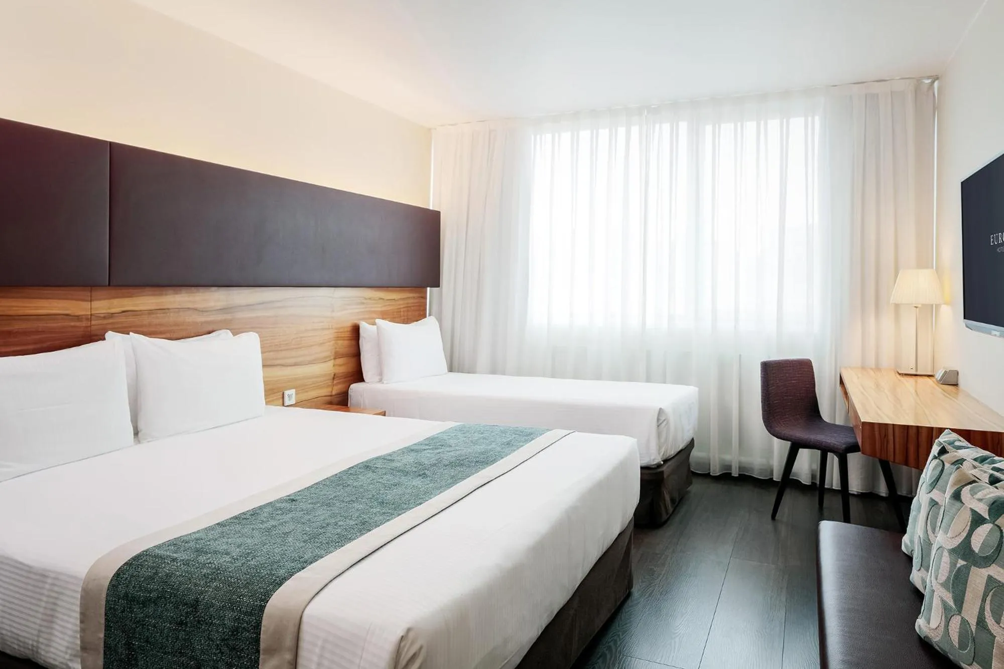 Bed in Eurostars Embassy