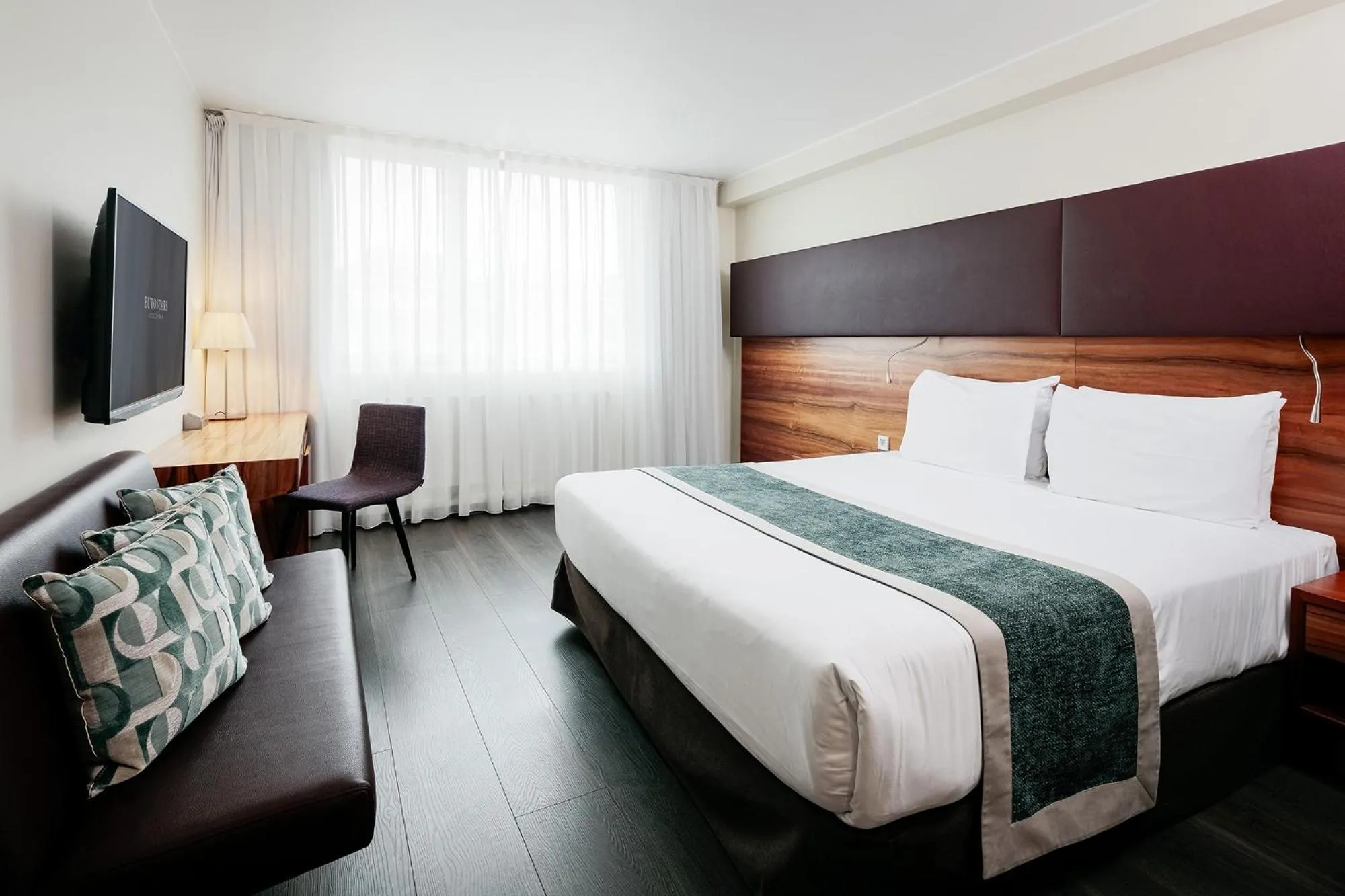 Bed in Eurostars Embassy