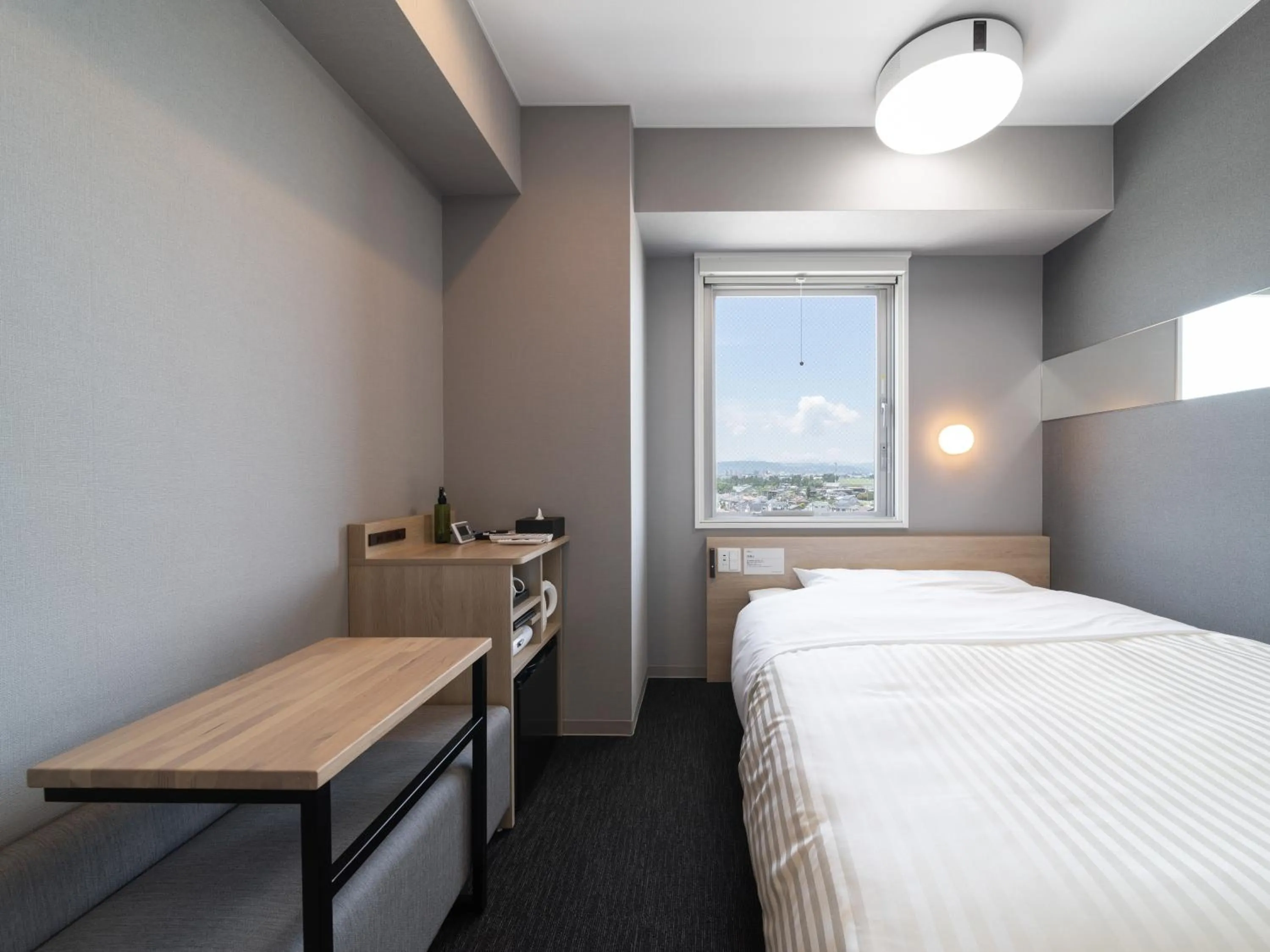 Bed in Super Hotel Nagoya Shinkansenguchi