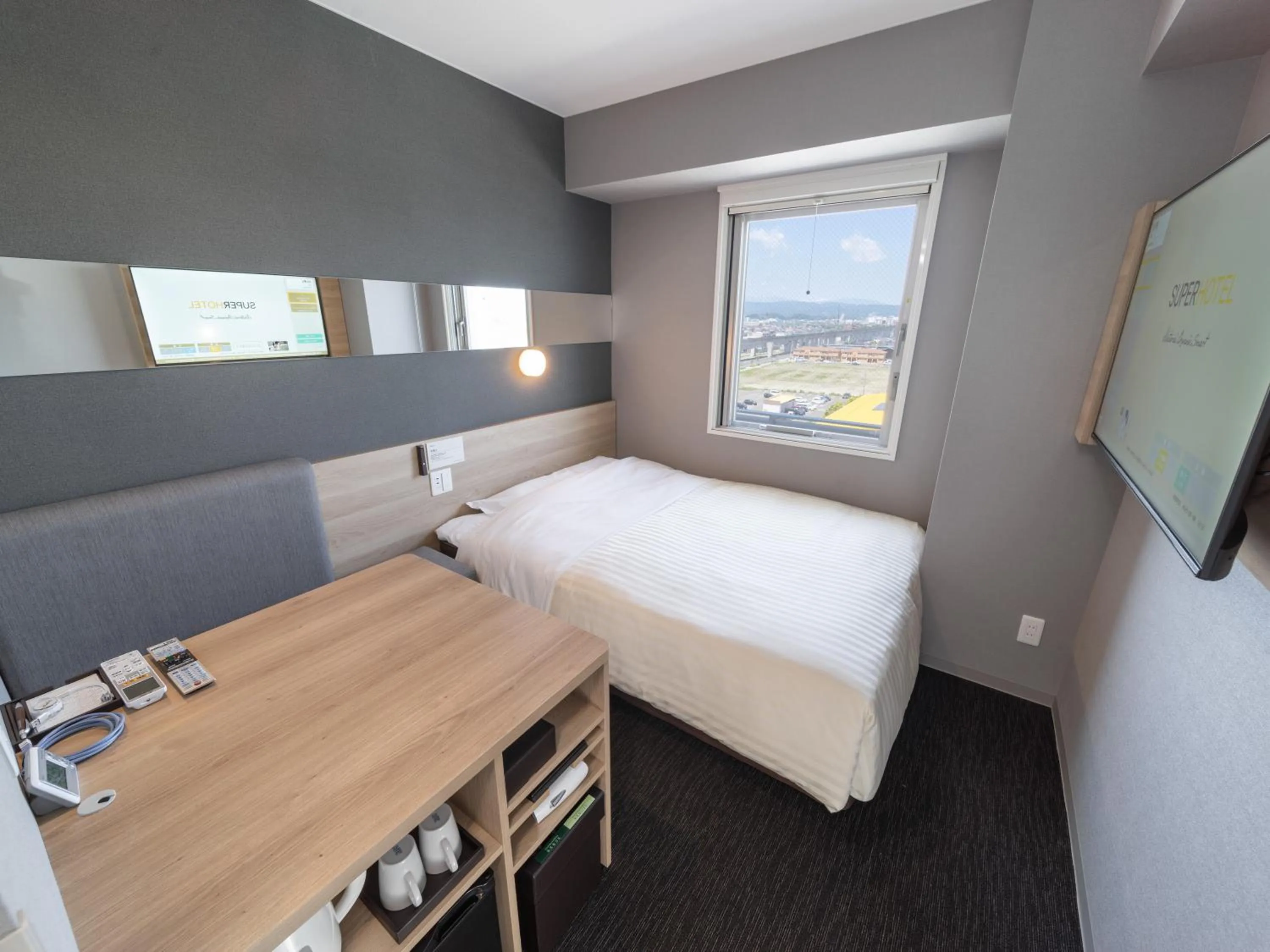 Photo of the whole room, Bed in Super Hotel Nagoya Shinkansenguchi