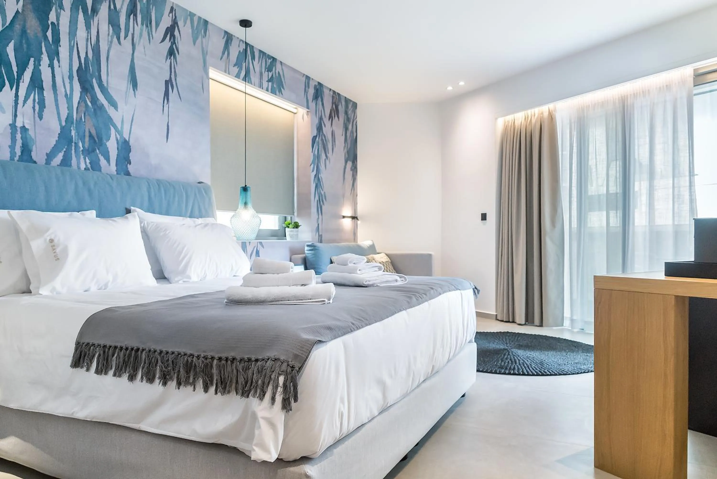 Bed in SAVUS Boutique Hotel