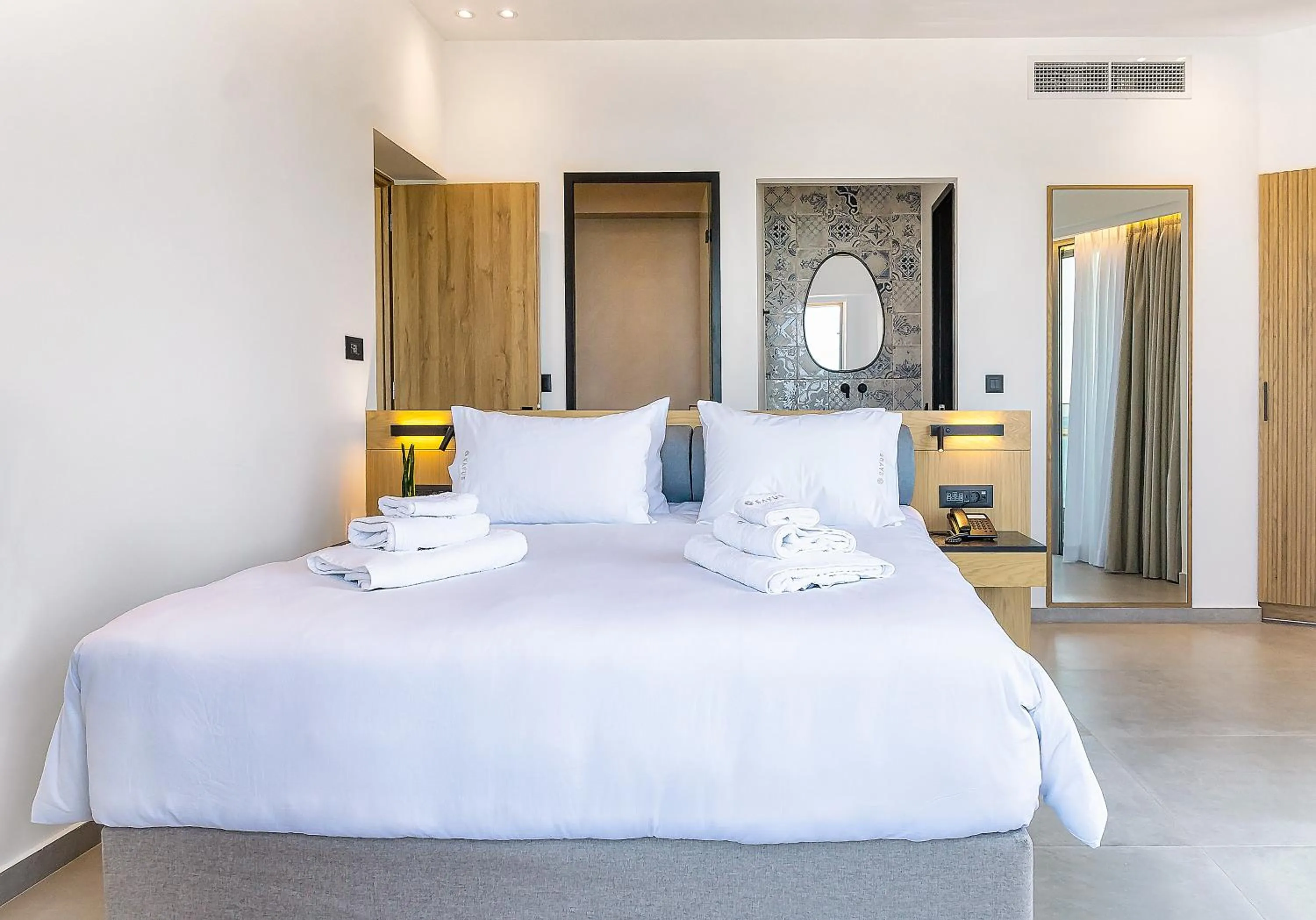 Bed in SAVUS Boutique Hotel