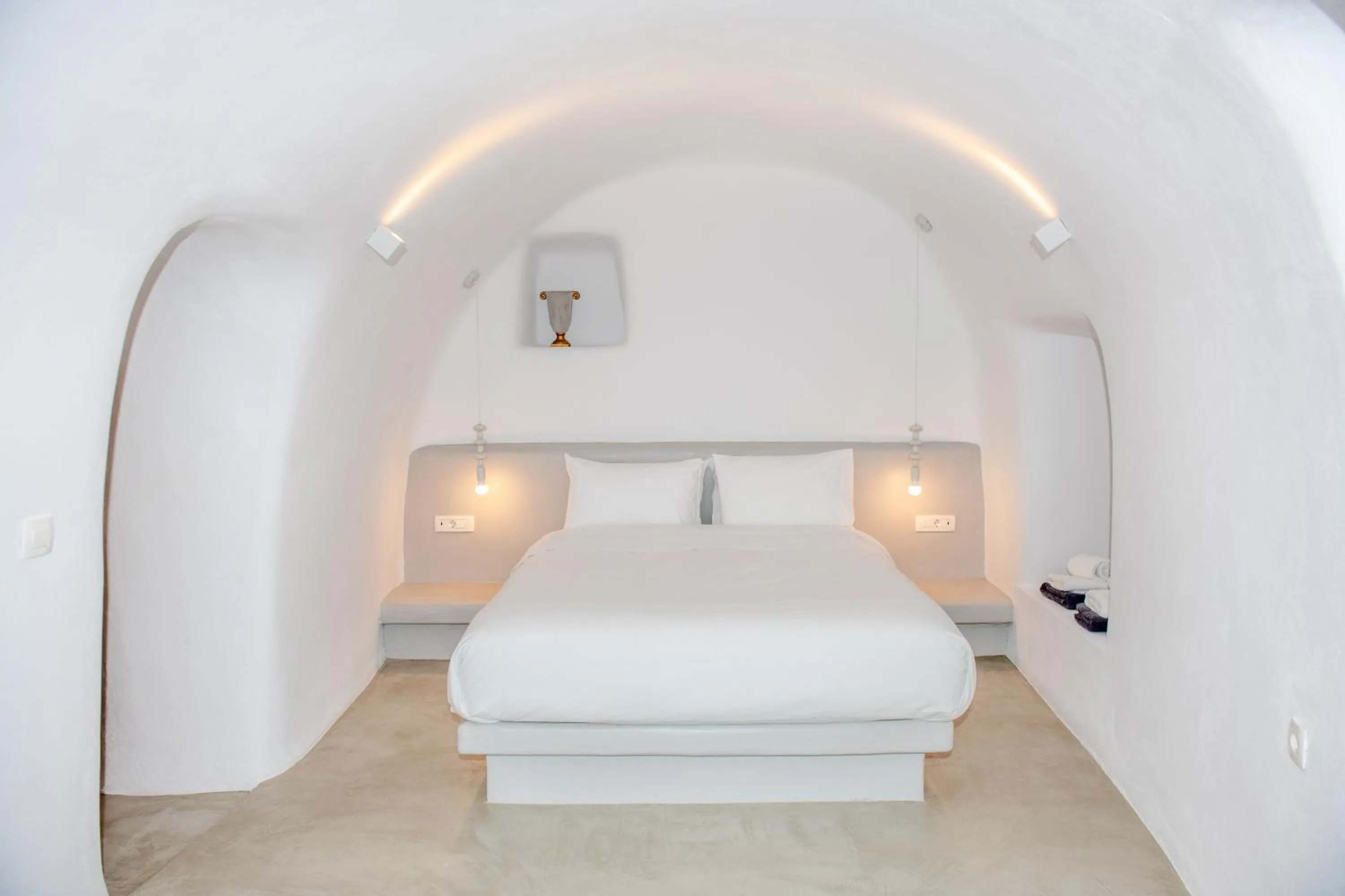 Bed in Oyster Luxury Suites