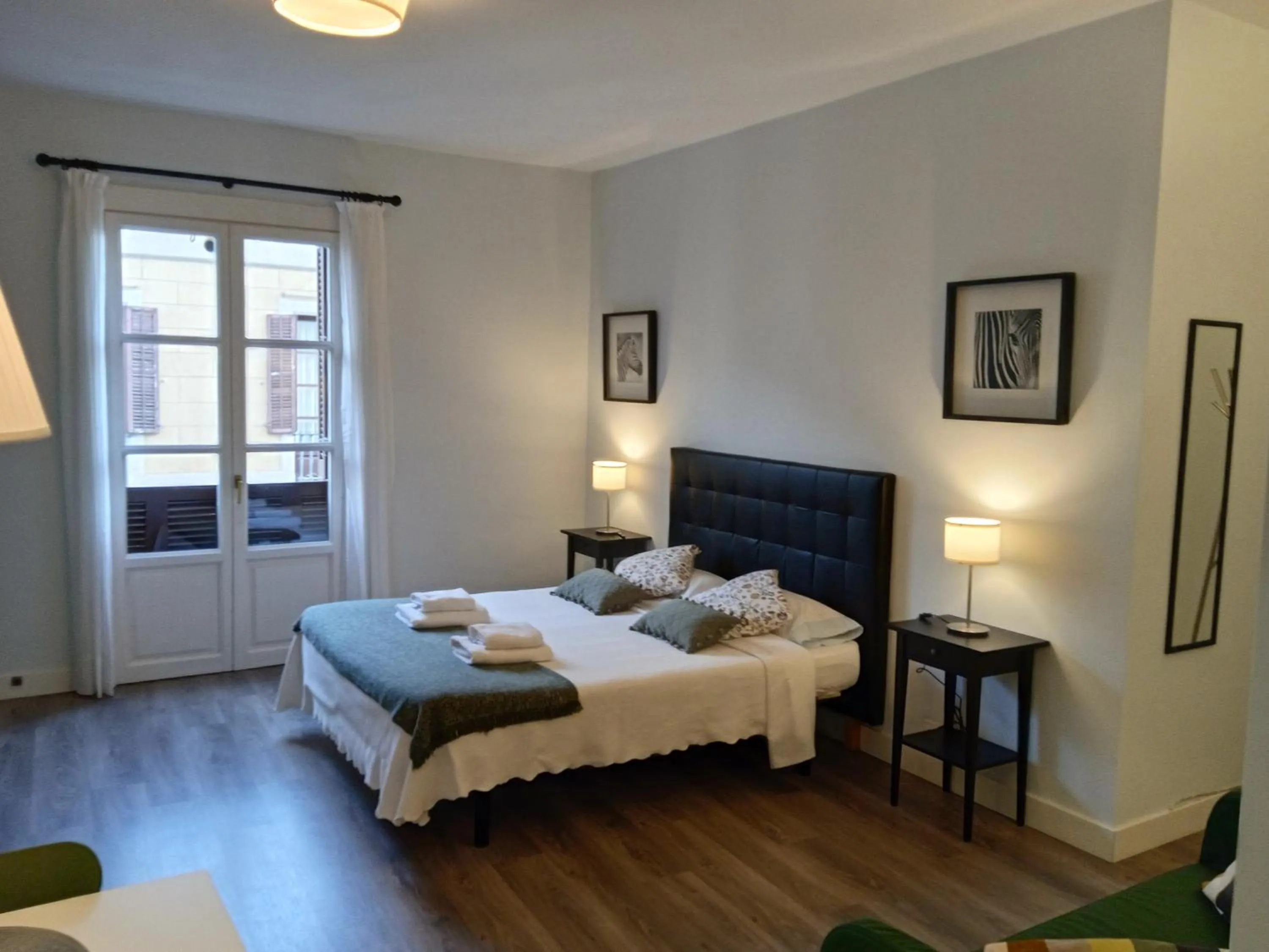 Bed in Colom Apartments