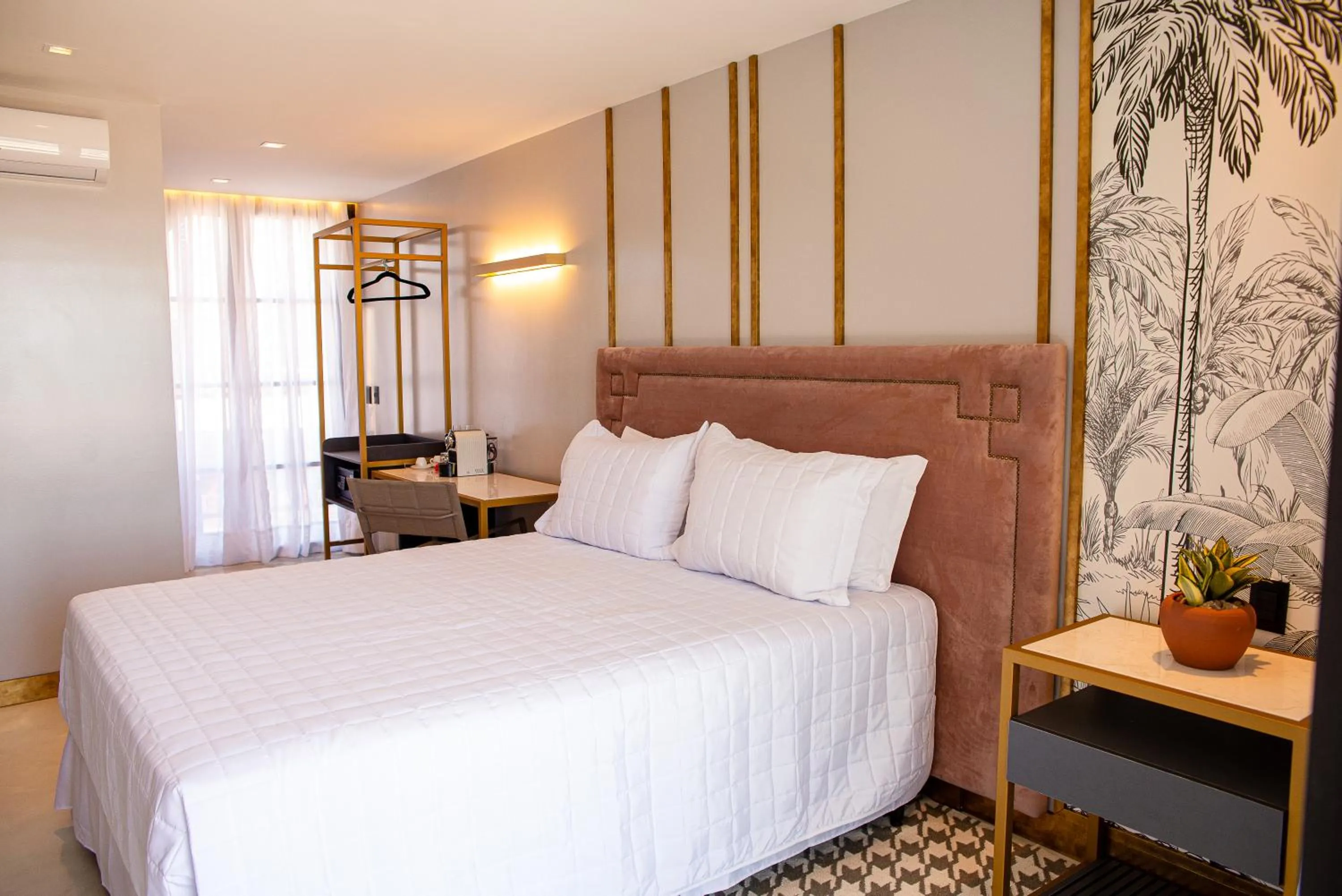 Bed in Exótica Boutique Hotel