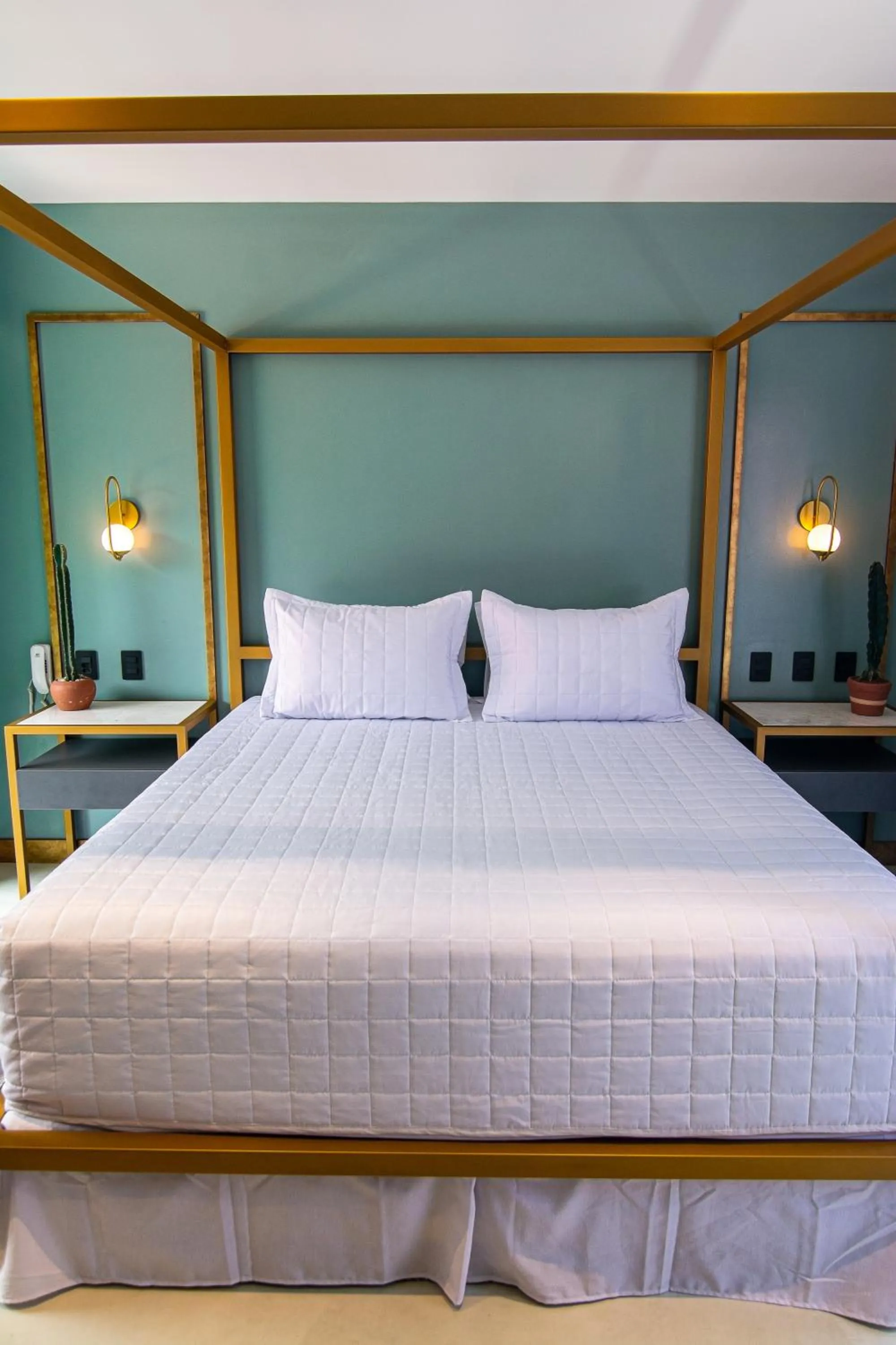 Bed in Exótica Boutique Hotel