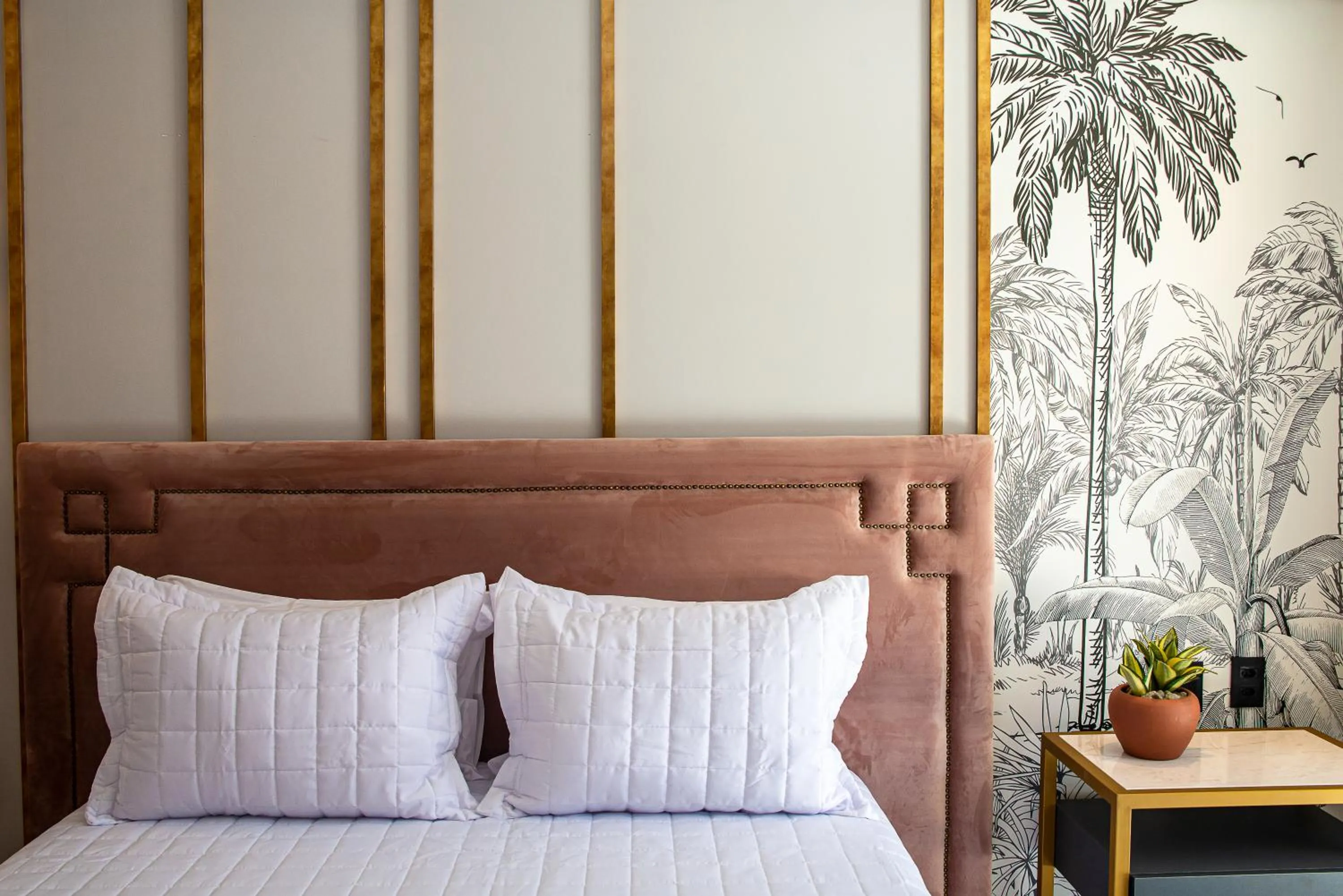 Bed in Exótica Boutique Hotel