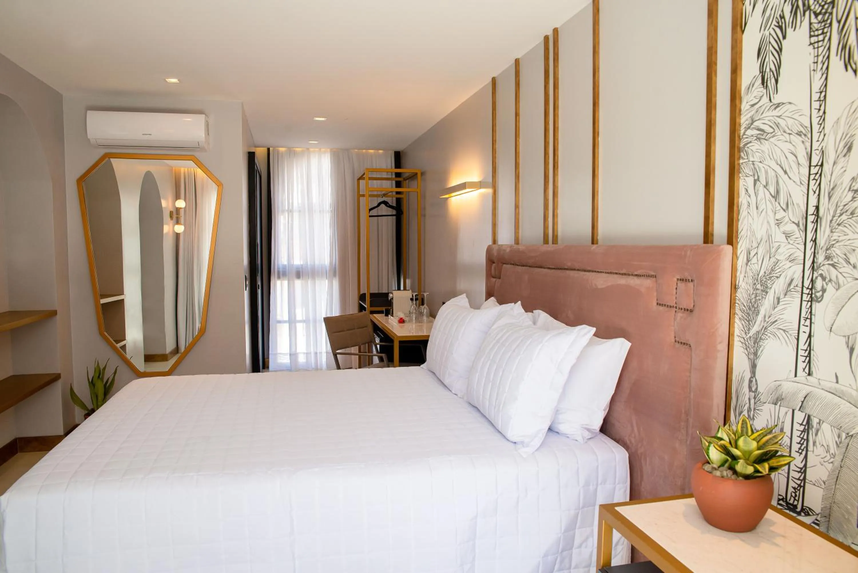 Bed in Exótica Boutique Hotel