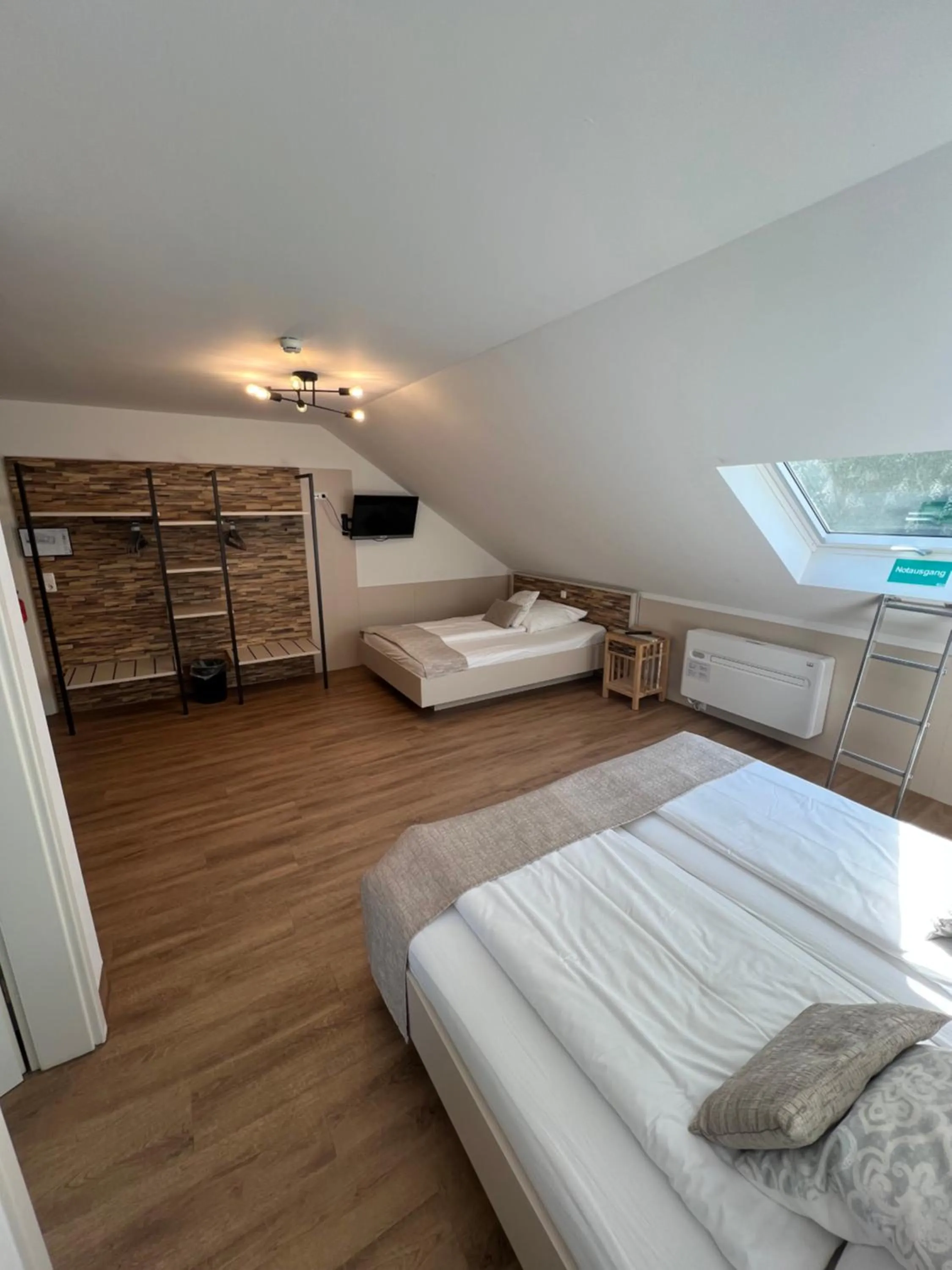 Photo of the whole room, Bed in Am Blumenhaus