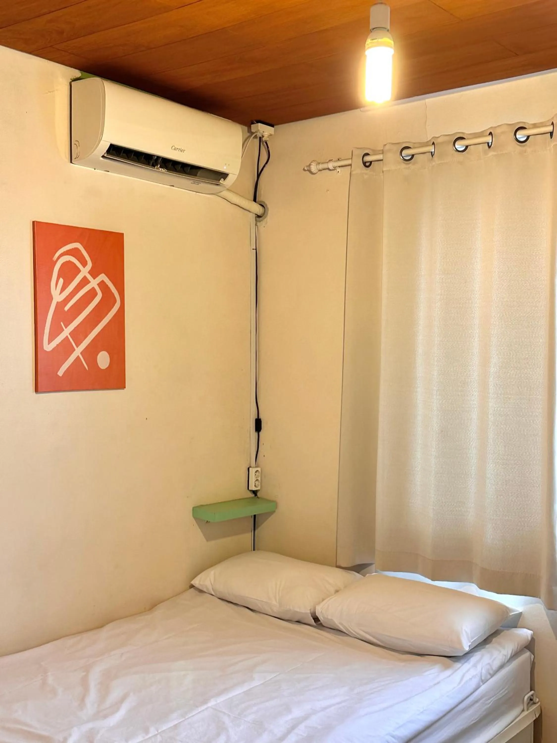 Bed in SISnBRO Guesthouse