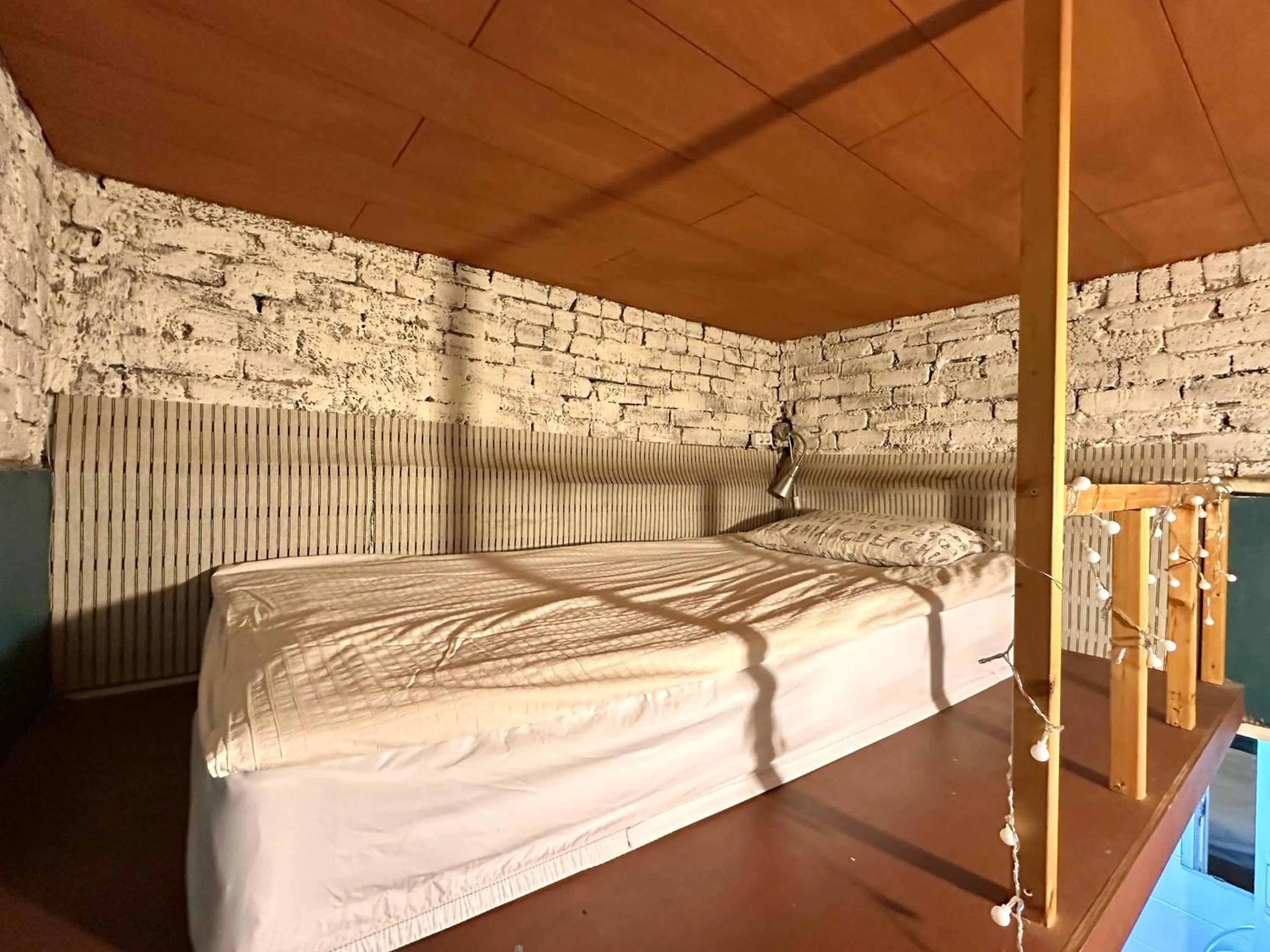 Bed in SISnBRO Guesthouse