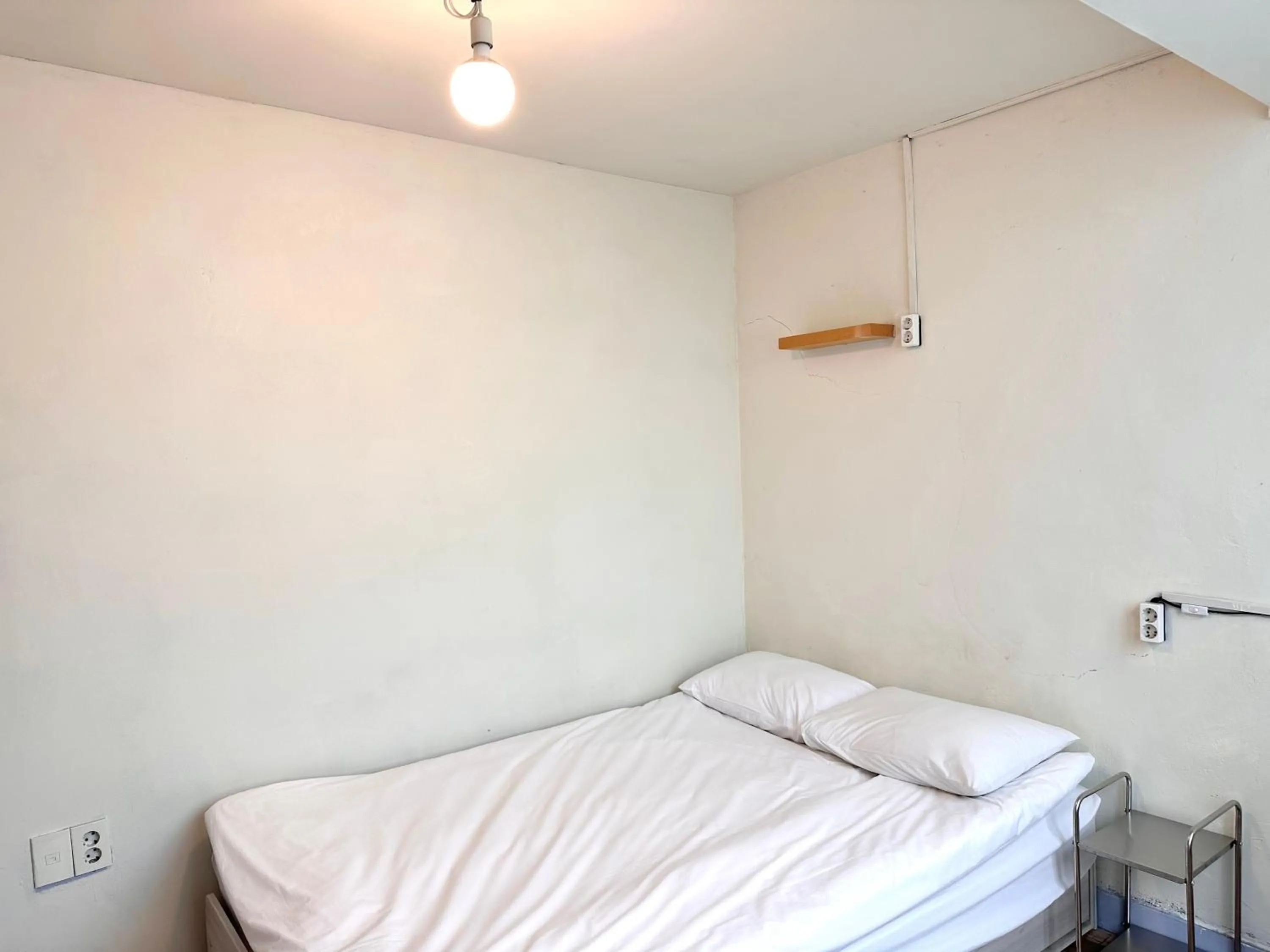 Bed in SISnBRO Guesthouse