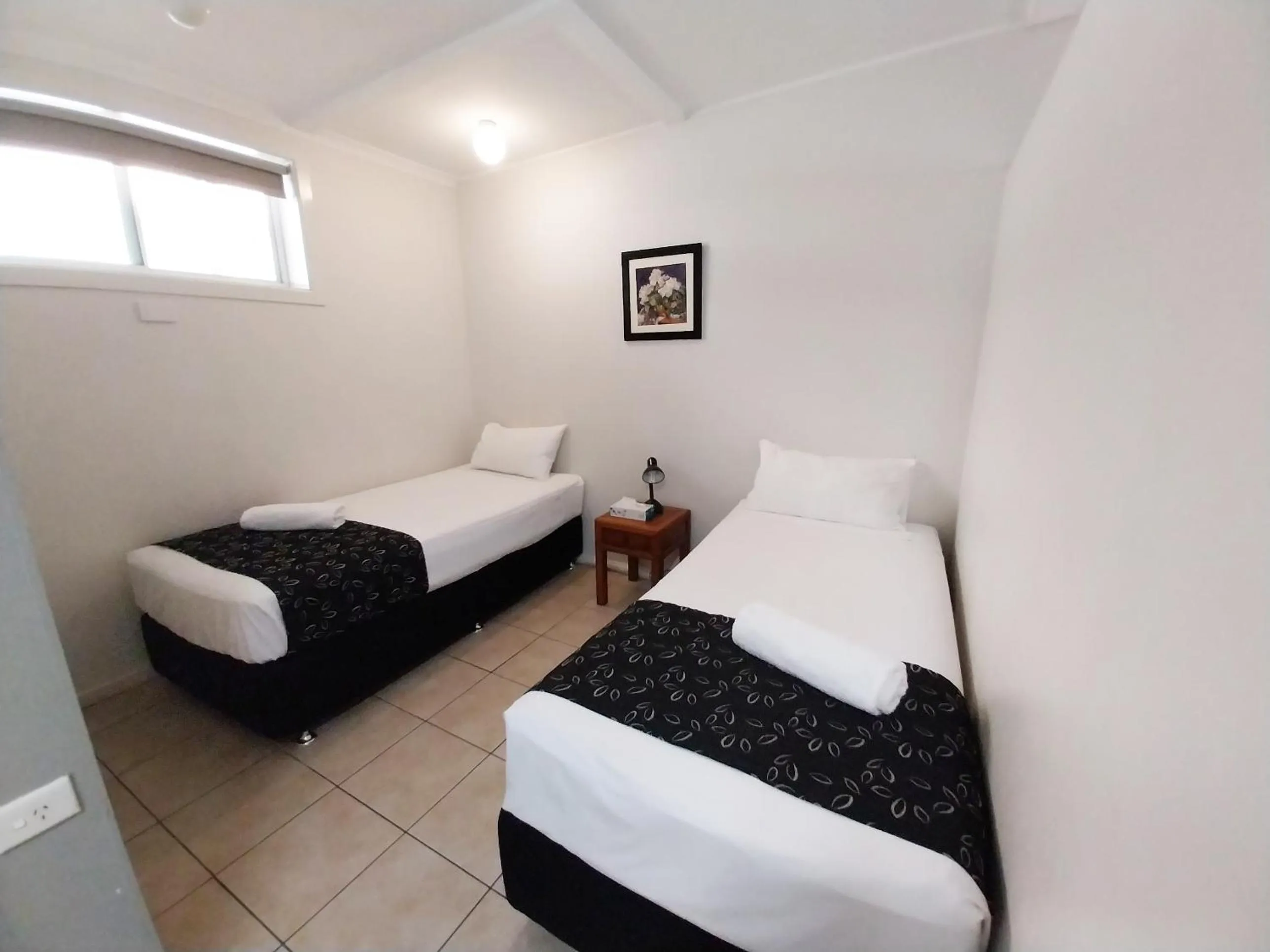 Bed in Tropic Coast Motel