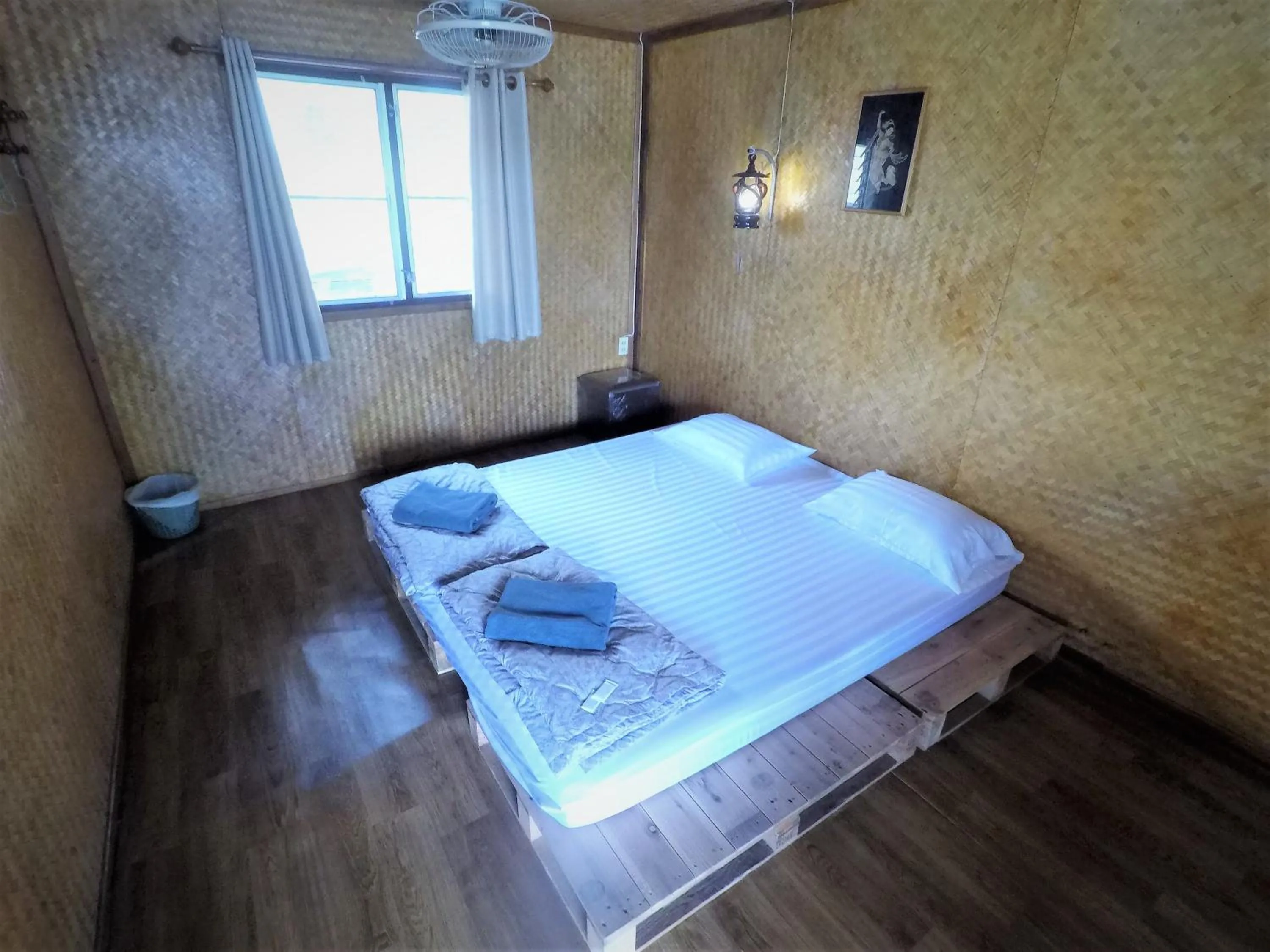 Bed in T & T Hostel Kanchanaburi