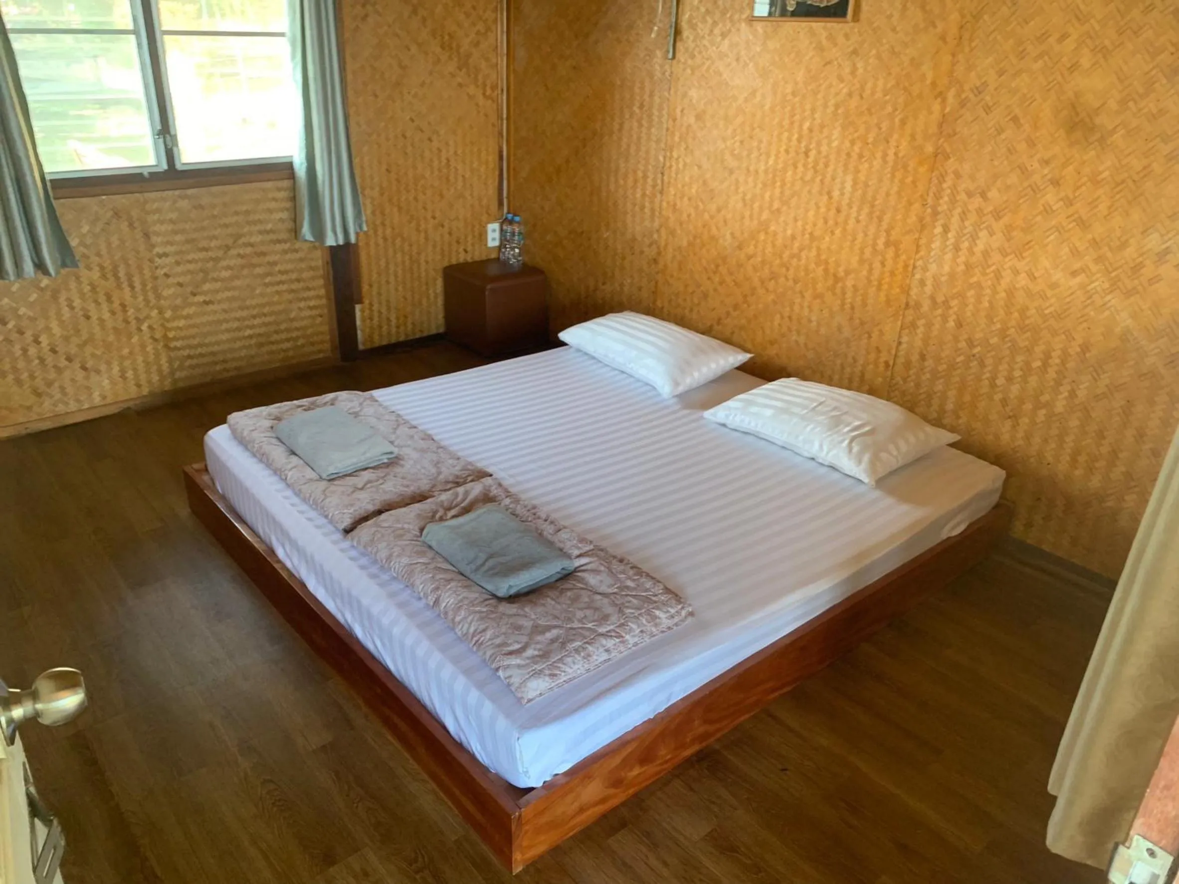 Bed in T & T Hostel Kanchanaburi